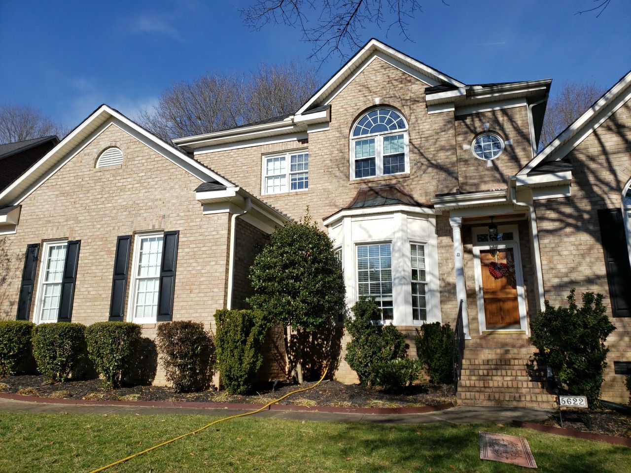 House Wash using cleaner by Power Wash Masters LLC