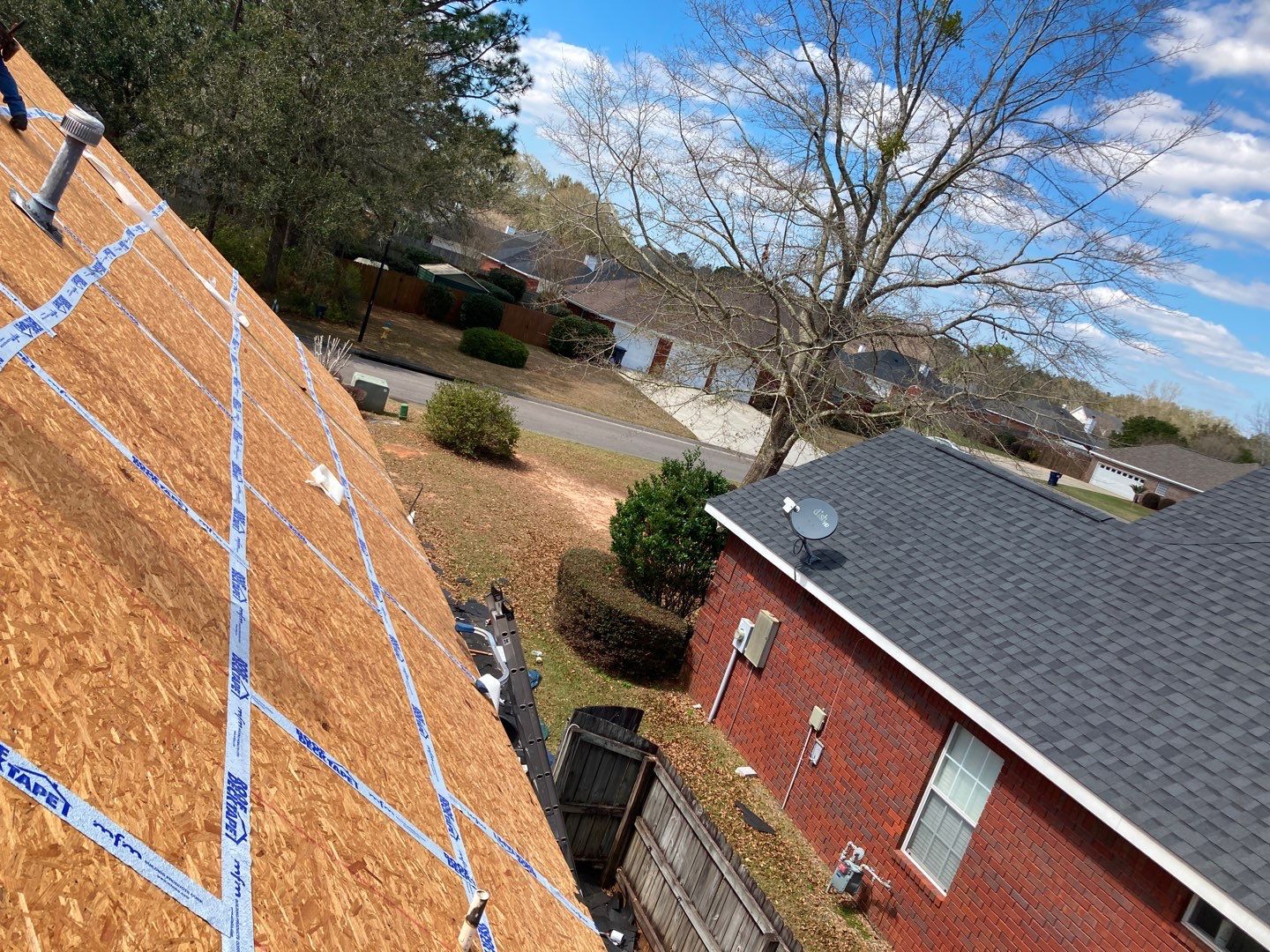 Residential Roofing Installation using Roof Replacement by American Roofing & Construction LLC