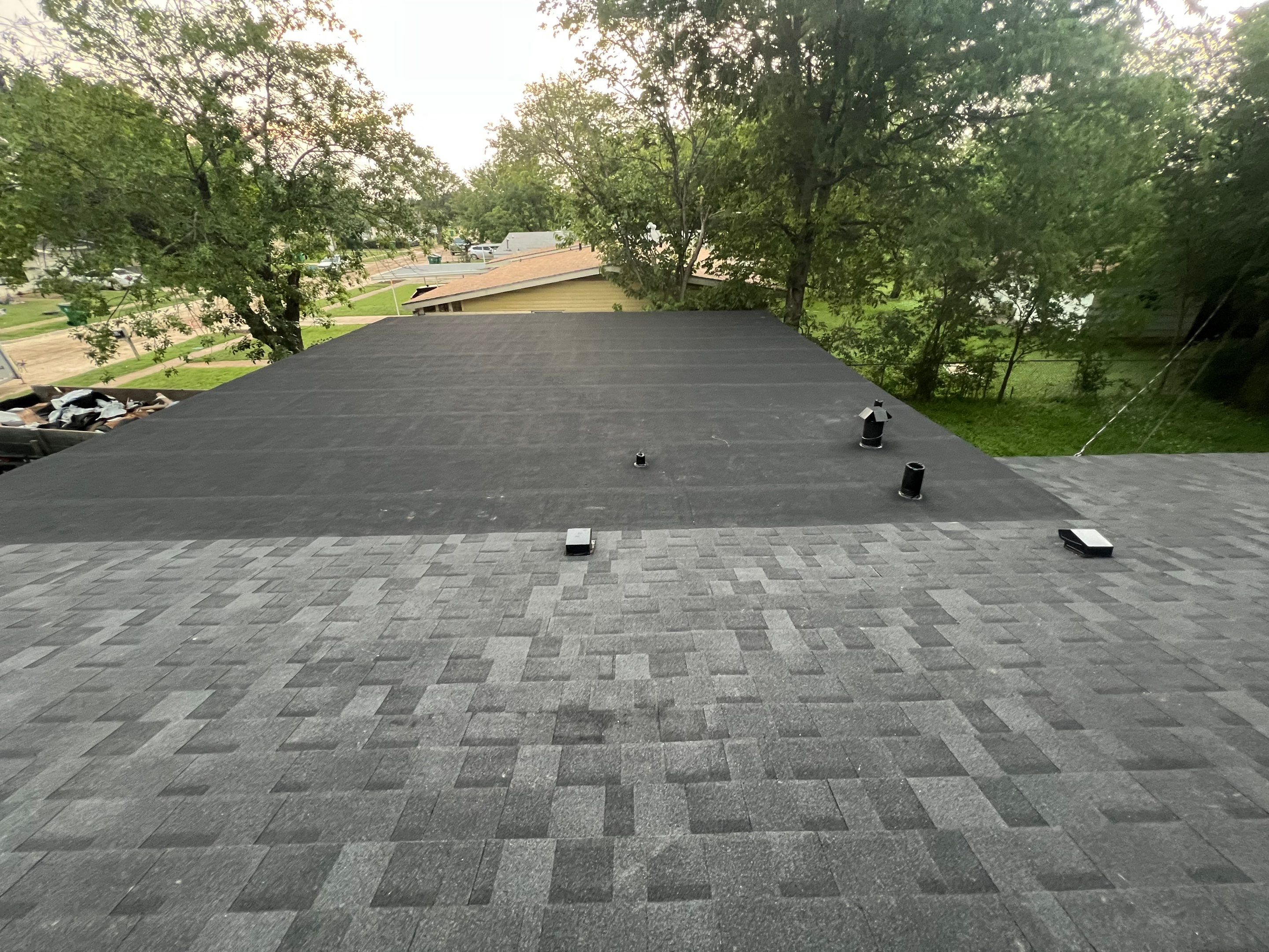 Residential Roofing Installation using IKO Cambridge Dual Black and Mule Hide Rolled Roofing Base and Cap Sheet by WR Roofing Solutions