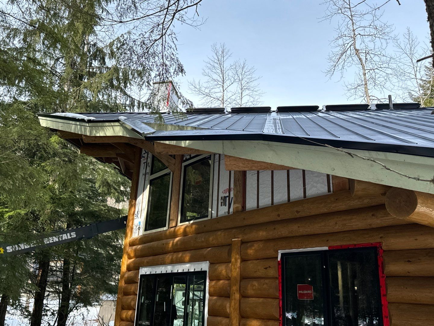 Residential Roofing Installation using 12" Prolok metal  by Top Notch Roofing Inc