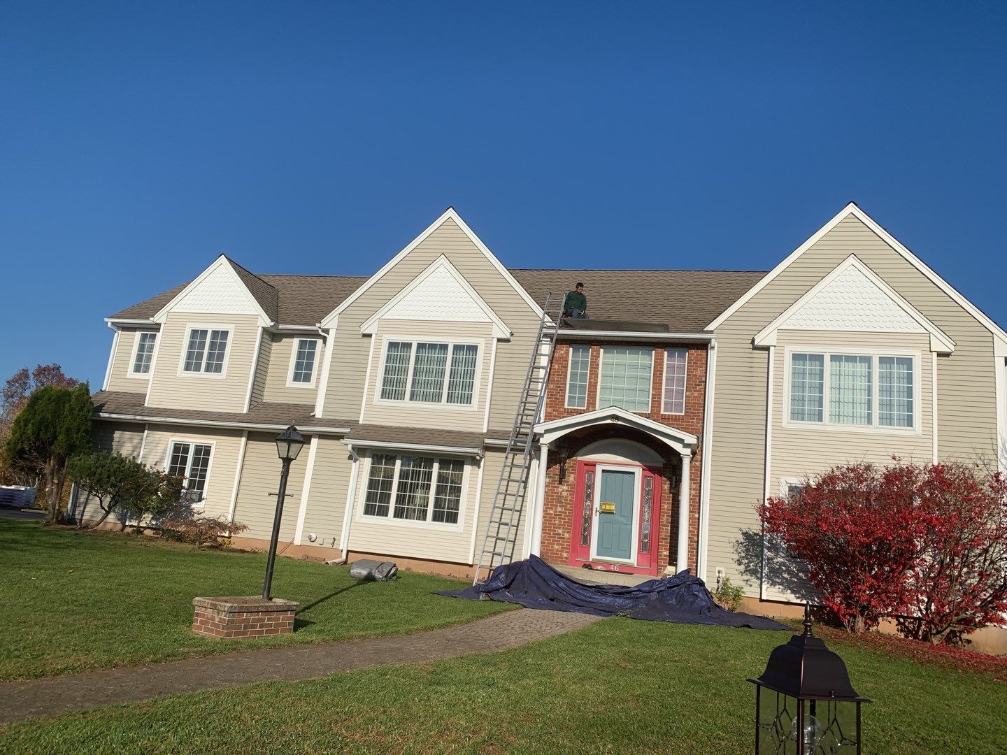 Commercial Roofing Installation using Owens Corning TruDefinition driftwood by A Plus Exterior