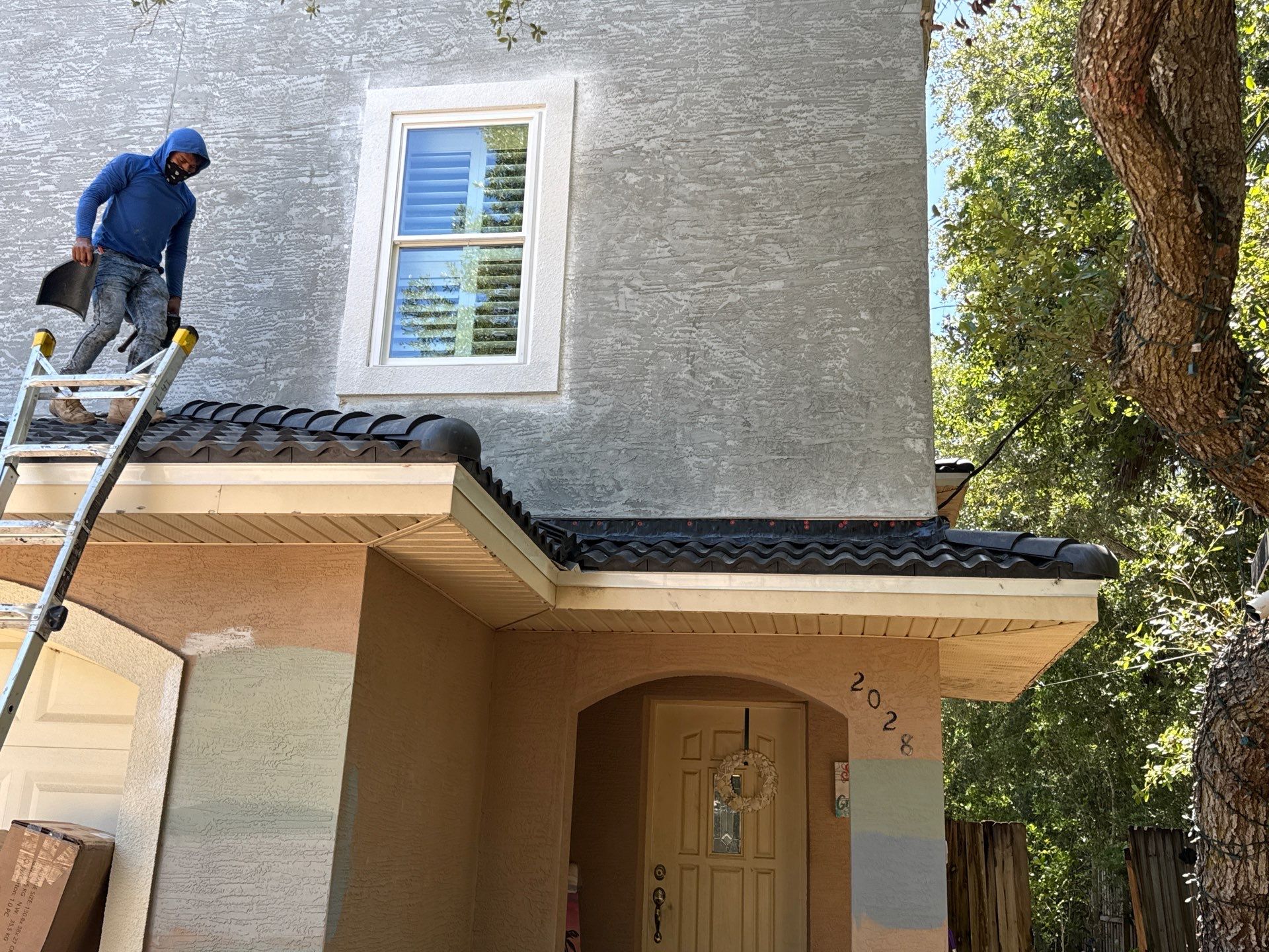 Flagler Beach Residential Tile Roof Replacement with Dark Barrel Tiles by Fortified Roofing Solutions Corp.