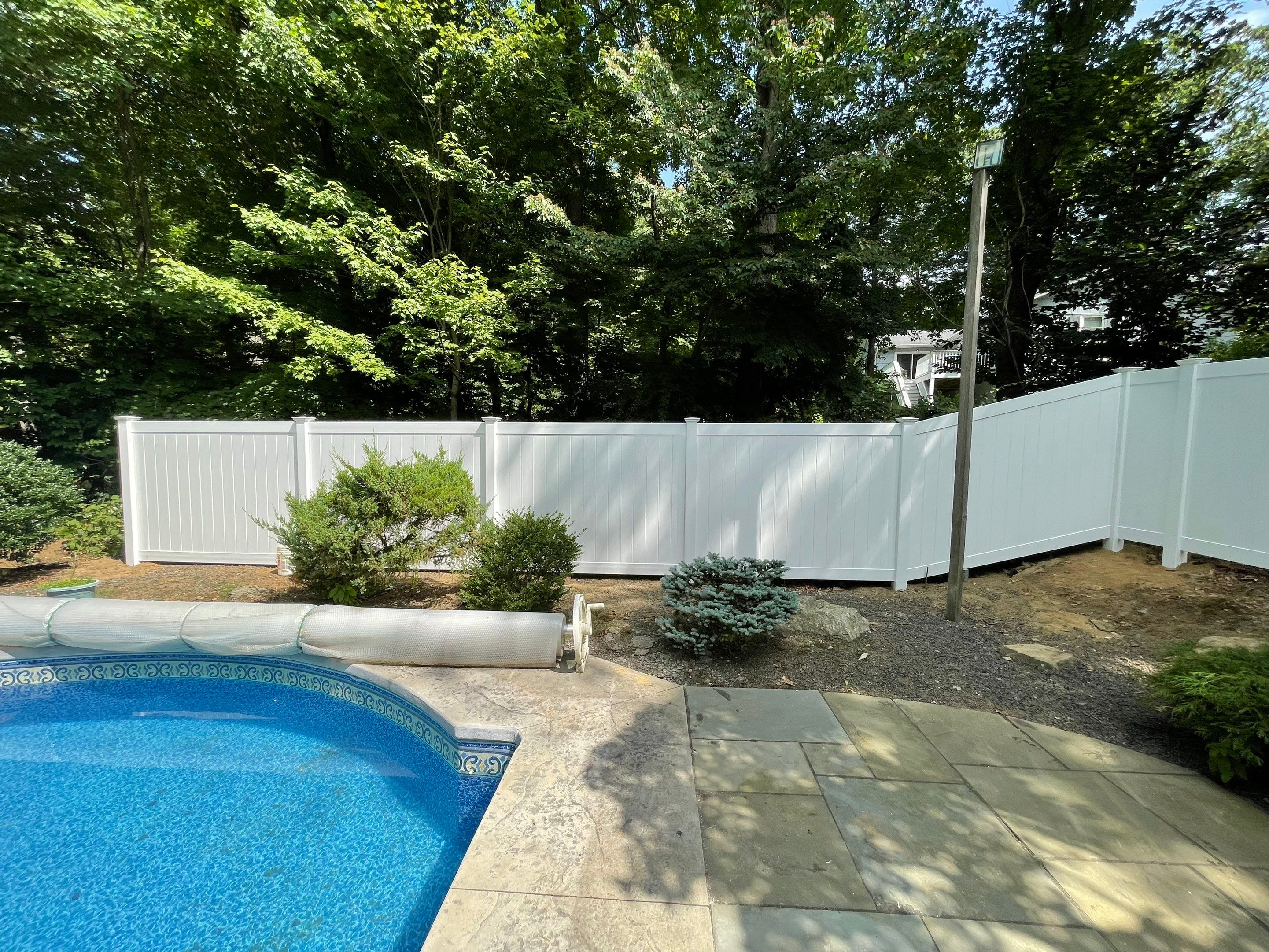 Pool Fence, Vinyl privacy fence and Vinyl picket style fence.  by DiGiorgi Roofing and Siding Inc