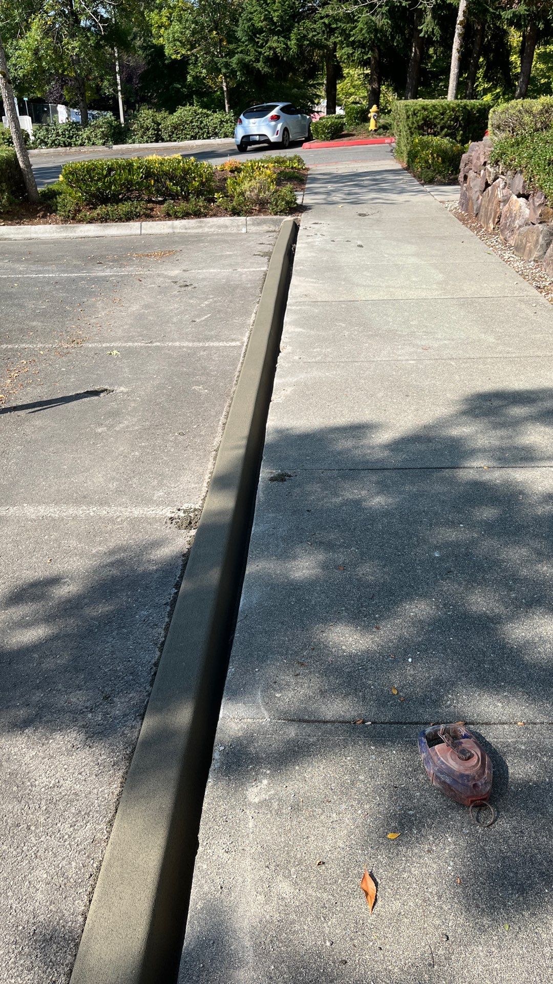 Kidder Matthews | Parking Lot Sealcoating & Striping with Concrete Curb & Patch Repairs  by Jireh Asphalt & Concrete Inc 