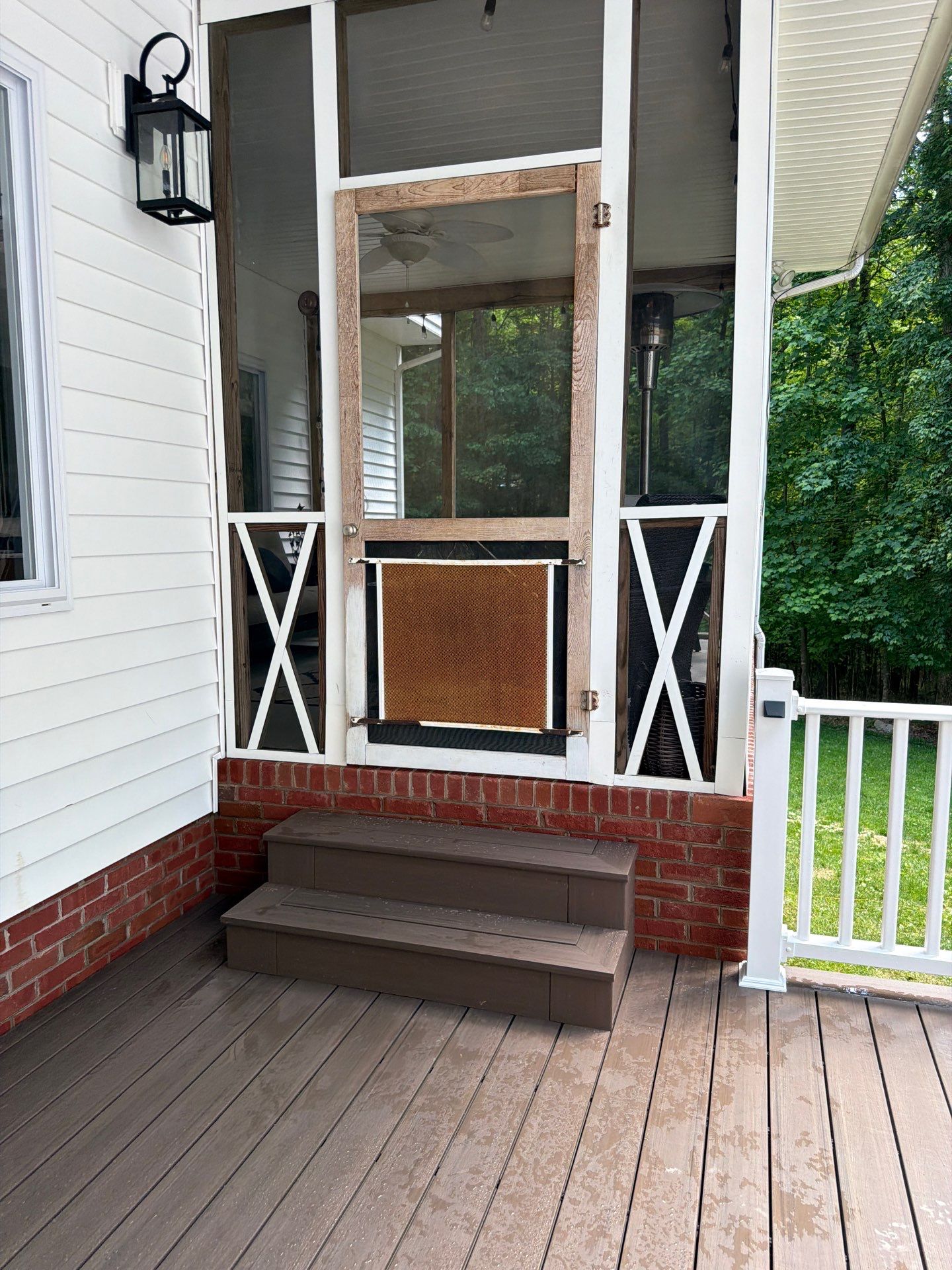 Custom Composite Deck and White Vinyl Railing Installation in Fayetteville by Walnut Hollow Decks & Outdoor Living