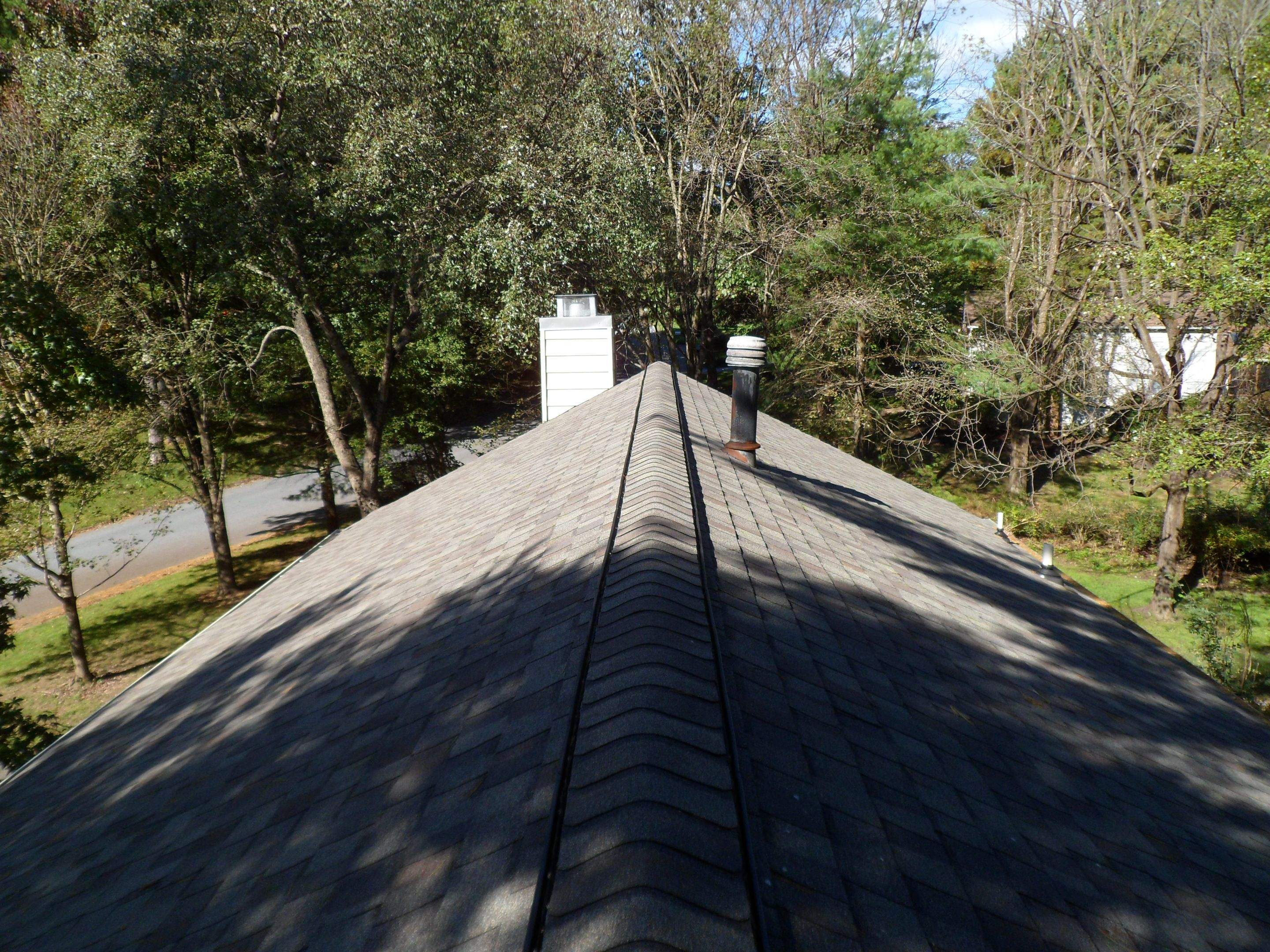 Residential Roofing Installation using Landmark Shingles Color Weatherwood by Alpha Design Services