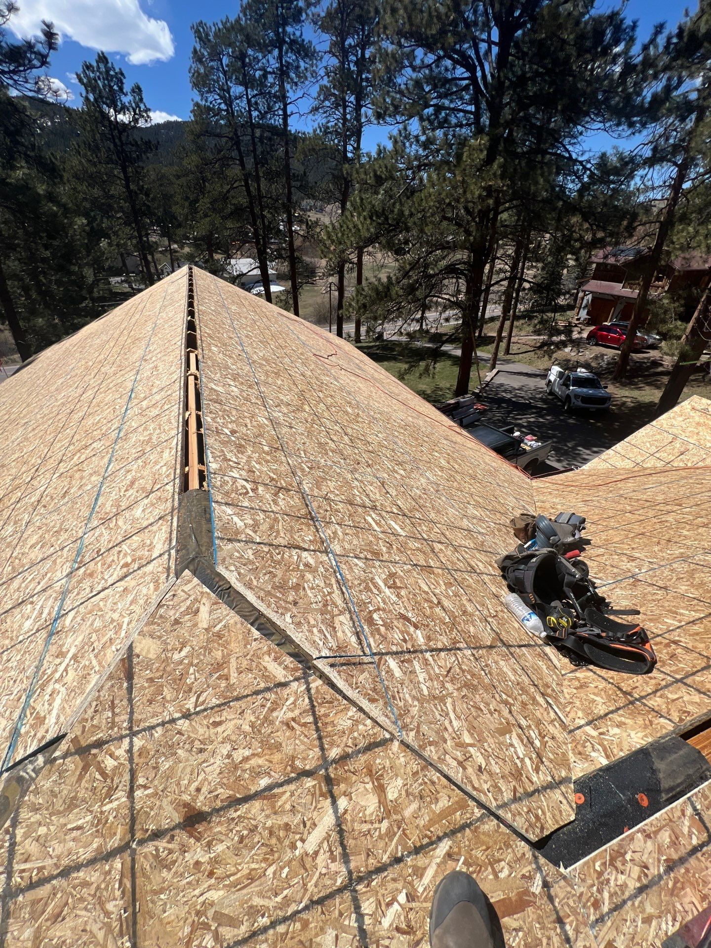 Residential Roofing Installation using Standing Seam Metal by Blue Peaks Roofing LLC 