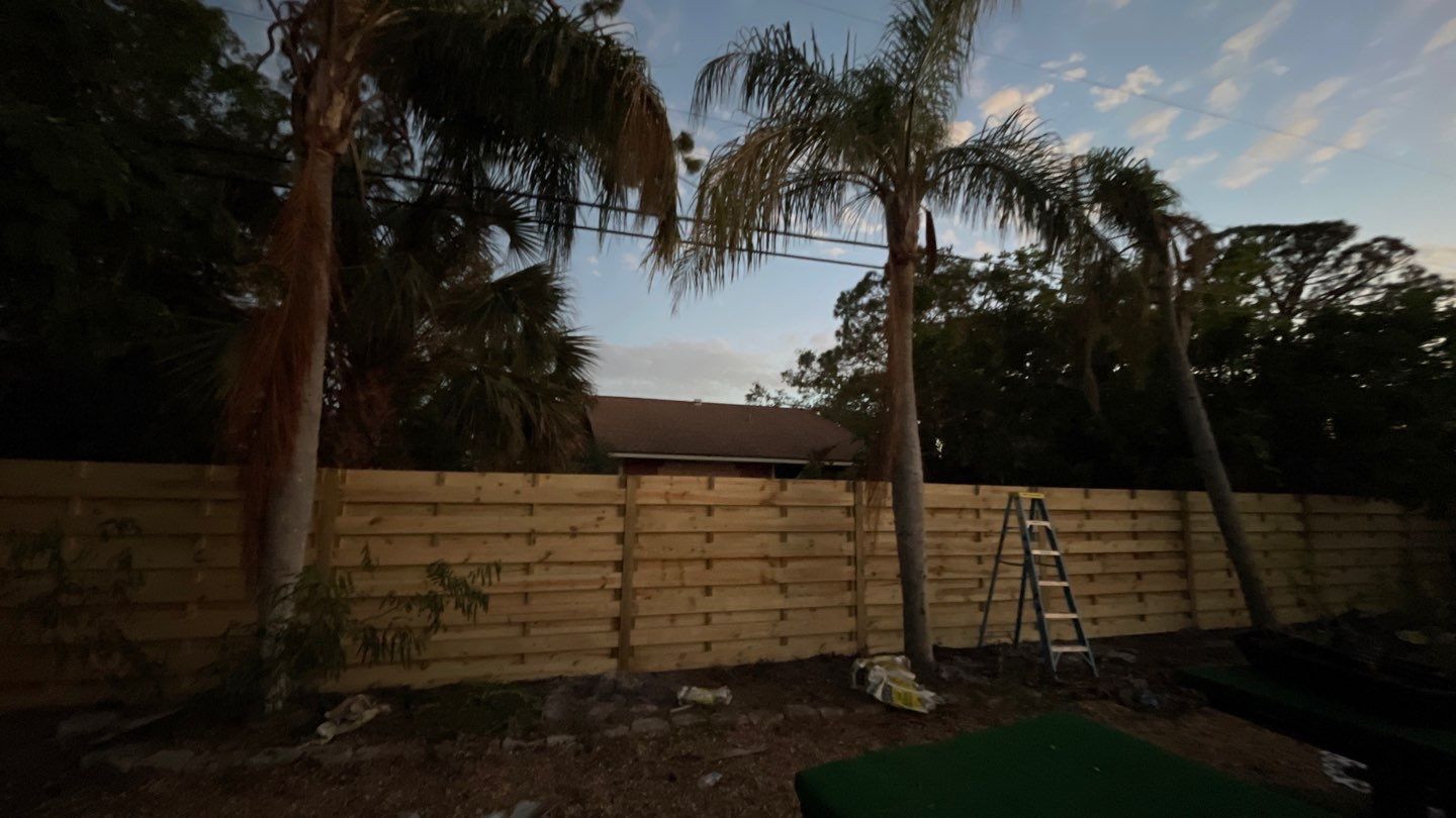 Wood Fence Installation using Horizontal Shadowbox Wood Privacy Fence by Asap fence and gates, LLC