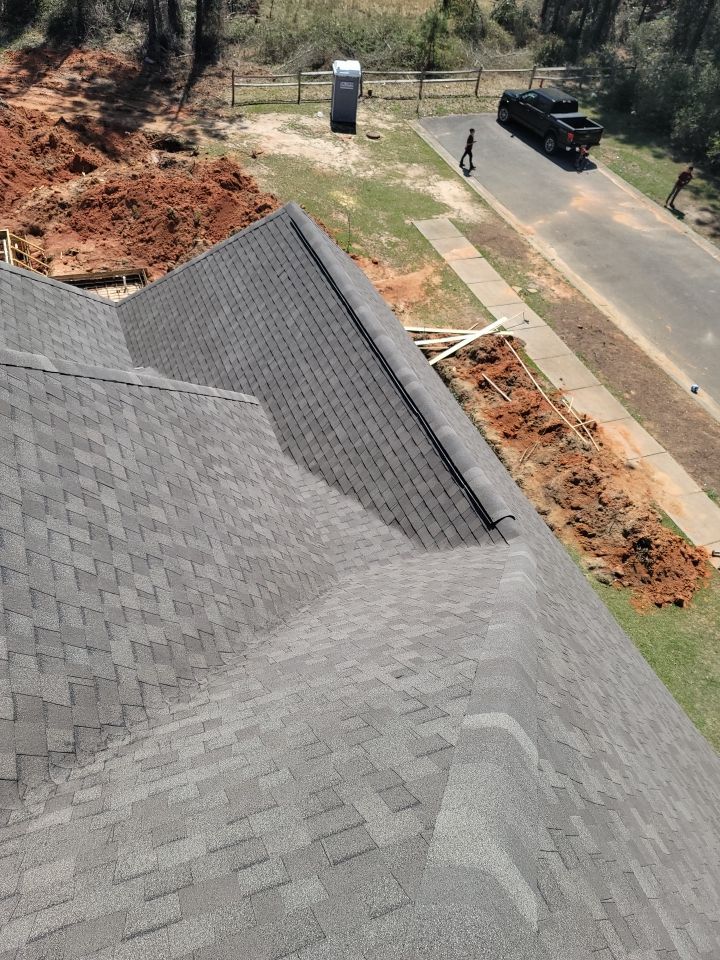 Residential Roofing Installation using Roof Replacement by American Roofing & Construction LLC