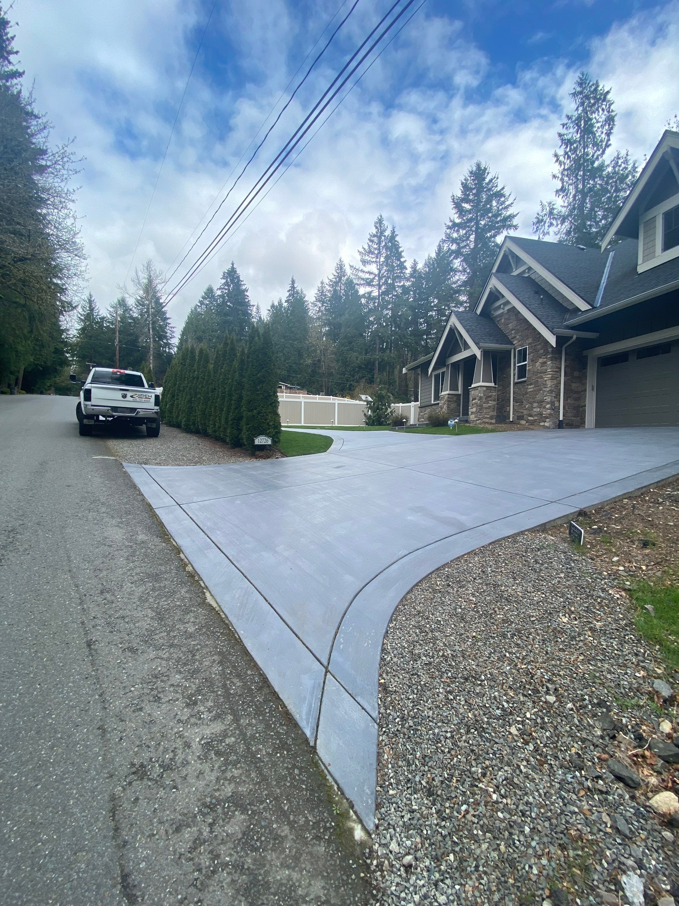 Melanie | Concrete Driveway  by Jireh Asphalt & Concrete Inc 