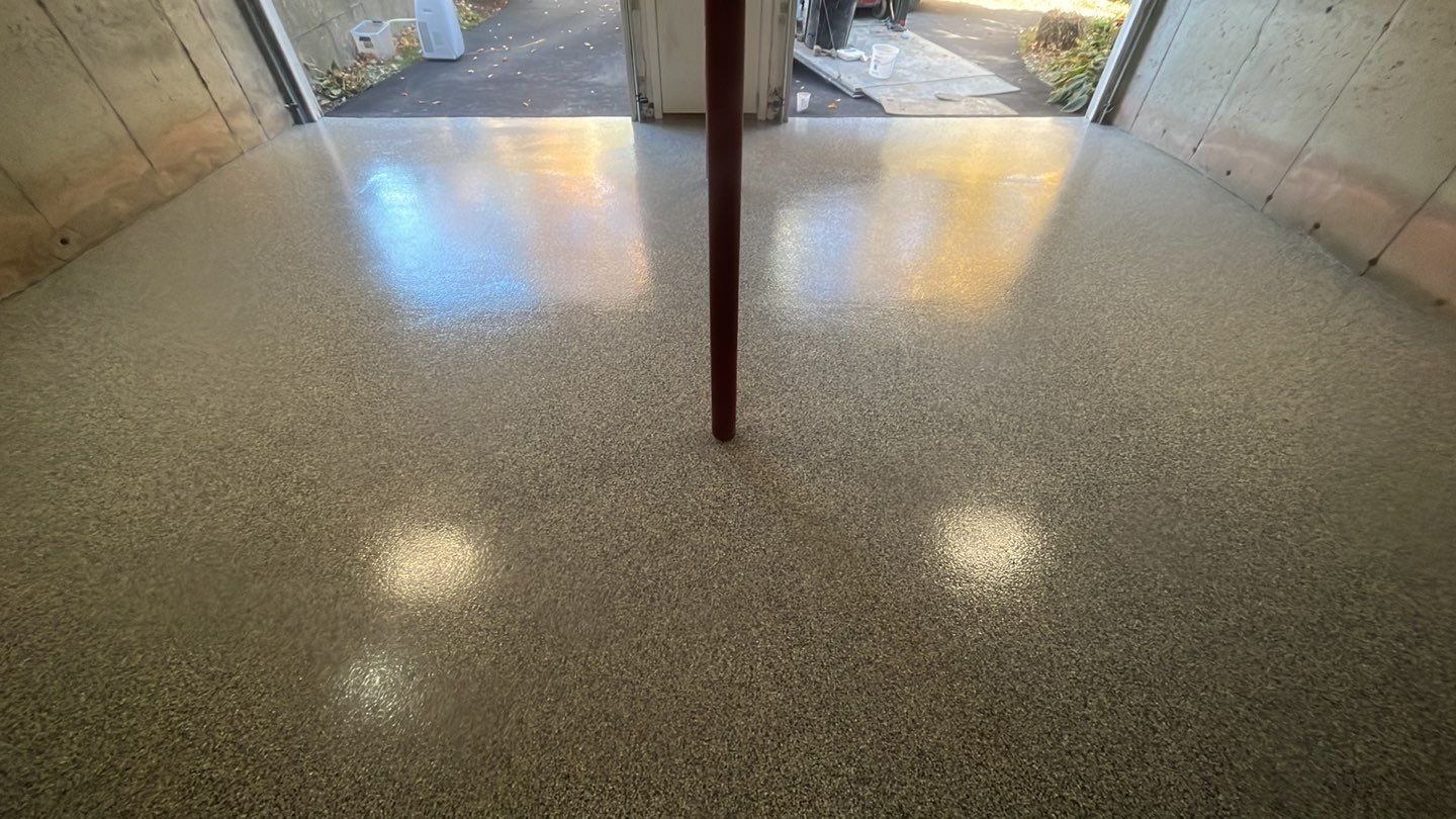 Garage in Londonderry, NH 03053 by Symphony Concrete Coatings
