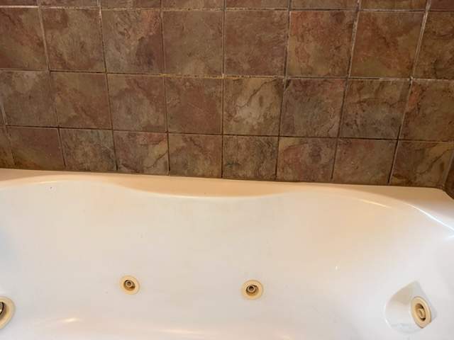 Jetted Bathtub & Custom Tile Bathroom Remodel by Laser Focused Solutions LLC