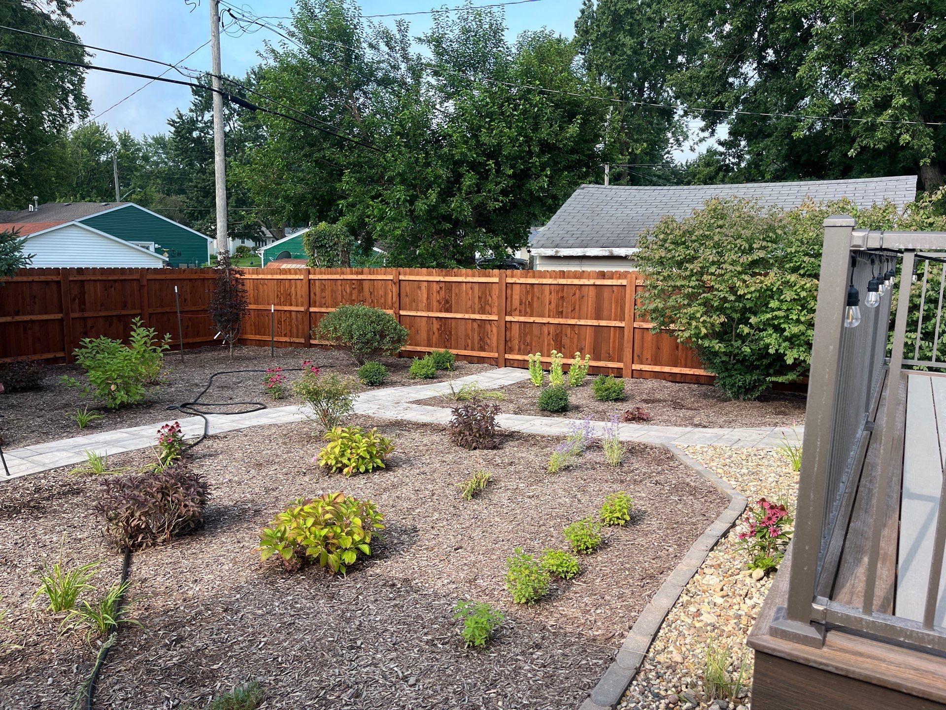 Custom Chestnut Stained Cedar Privacy Fence in Waterloo by Perfect Picket Fence and Stain