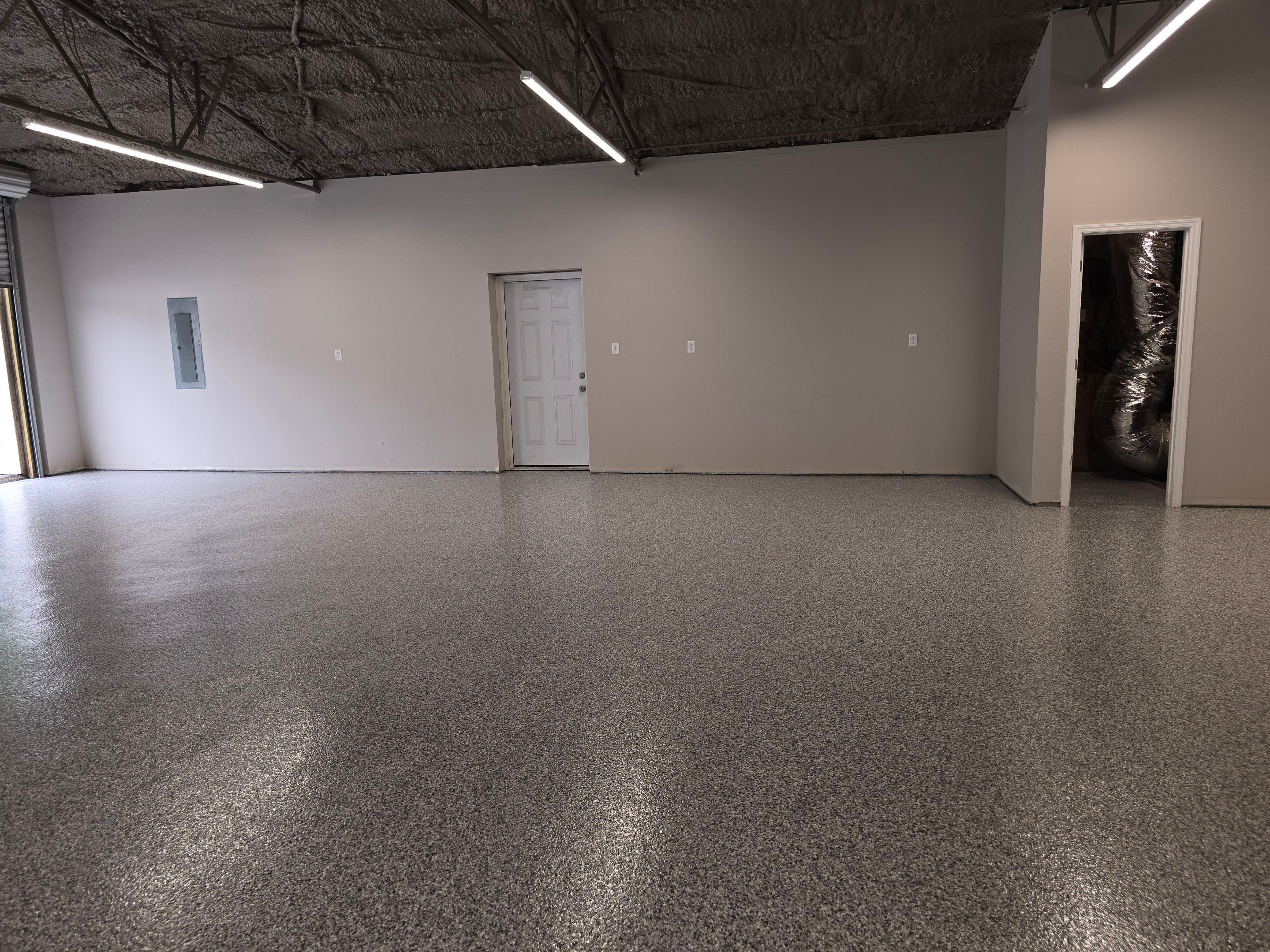 Super old and oily concrete brought back to life by Elite Floor Solutions