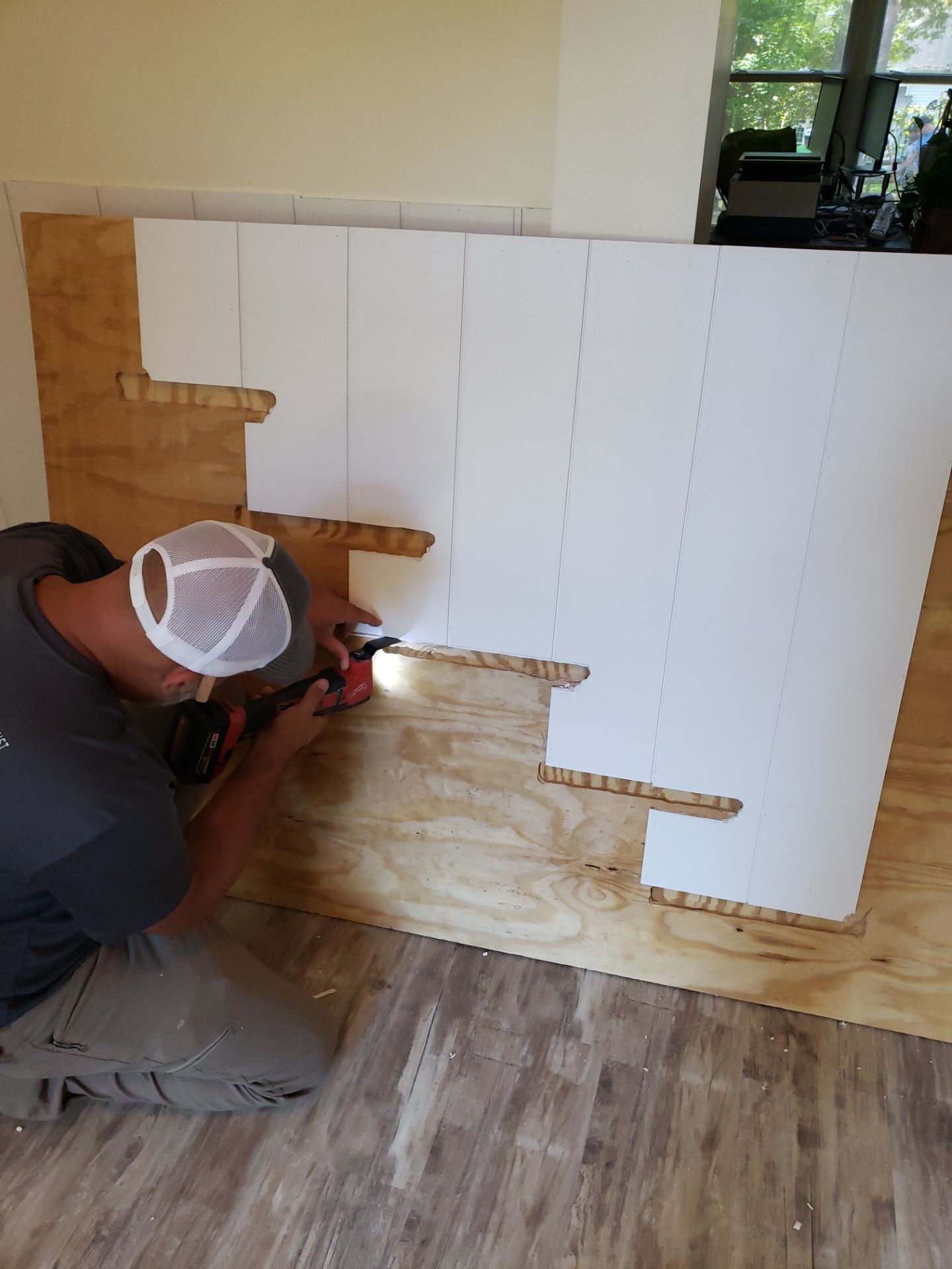 Front Room Transformed into a Waterproof Pet Room by A Step Above Handy LLC 