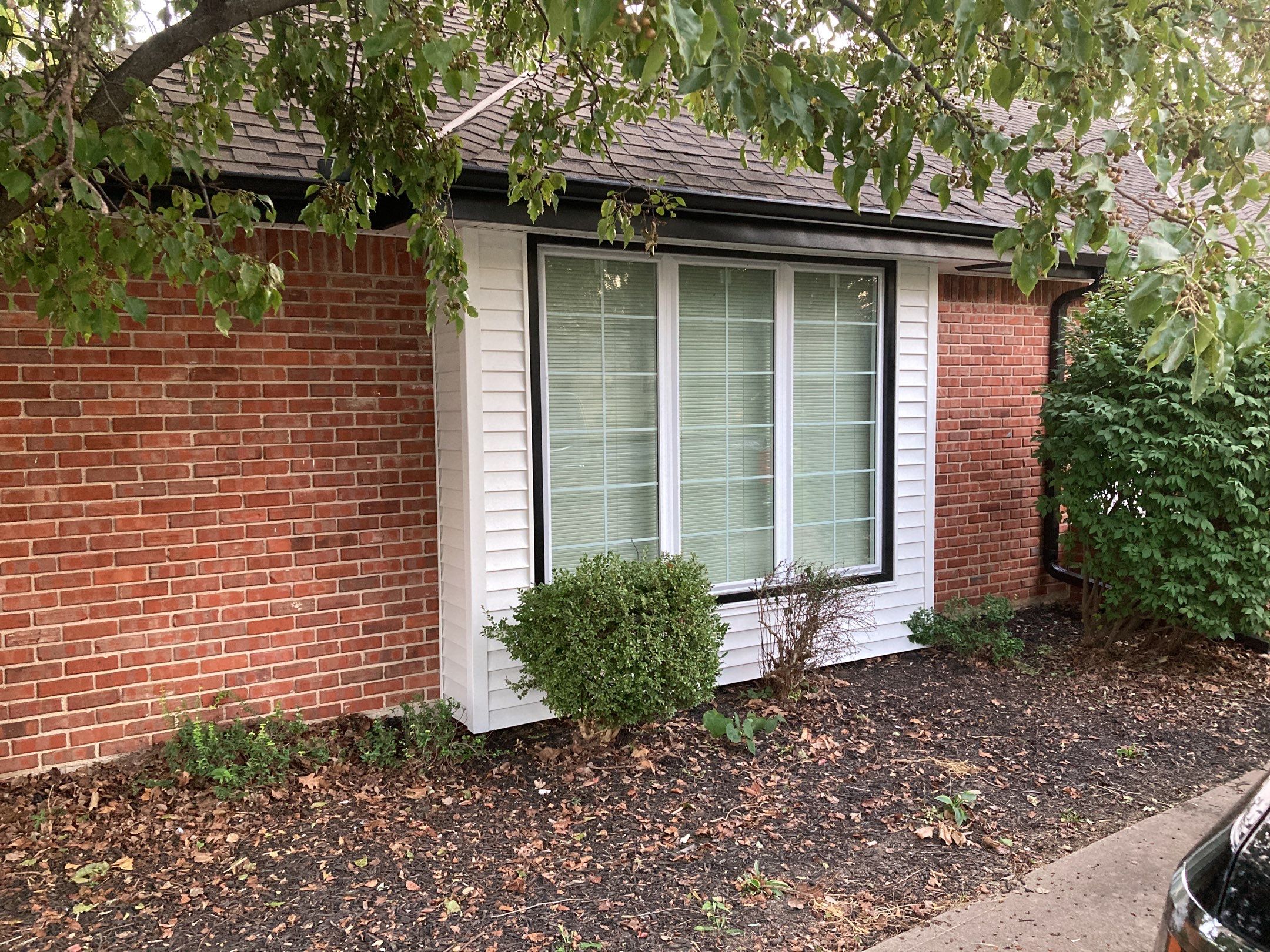 New white siding with Black trim by EEC  Windows, Siding & Roofing 