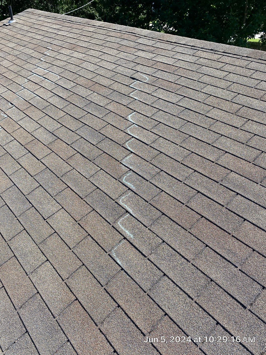 Roof inspection in Bartlesville by Decor Roofing & Restoration