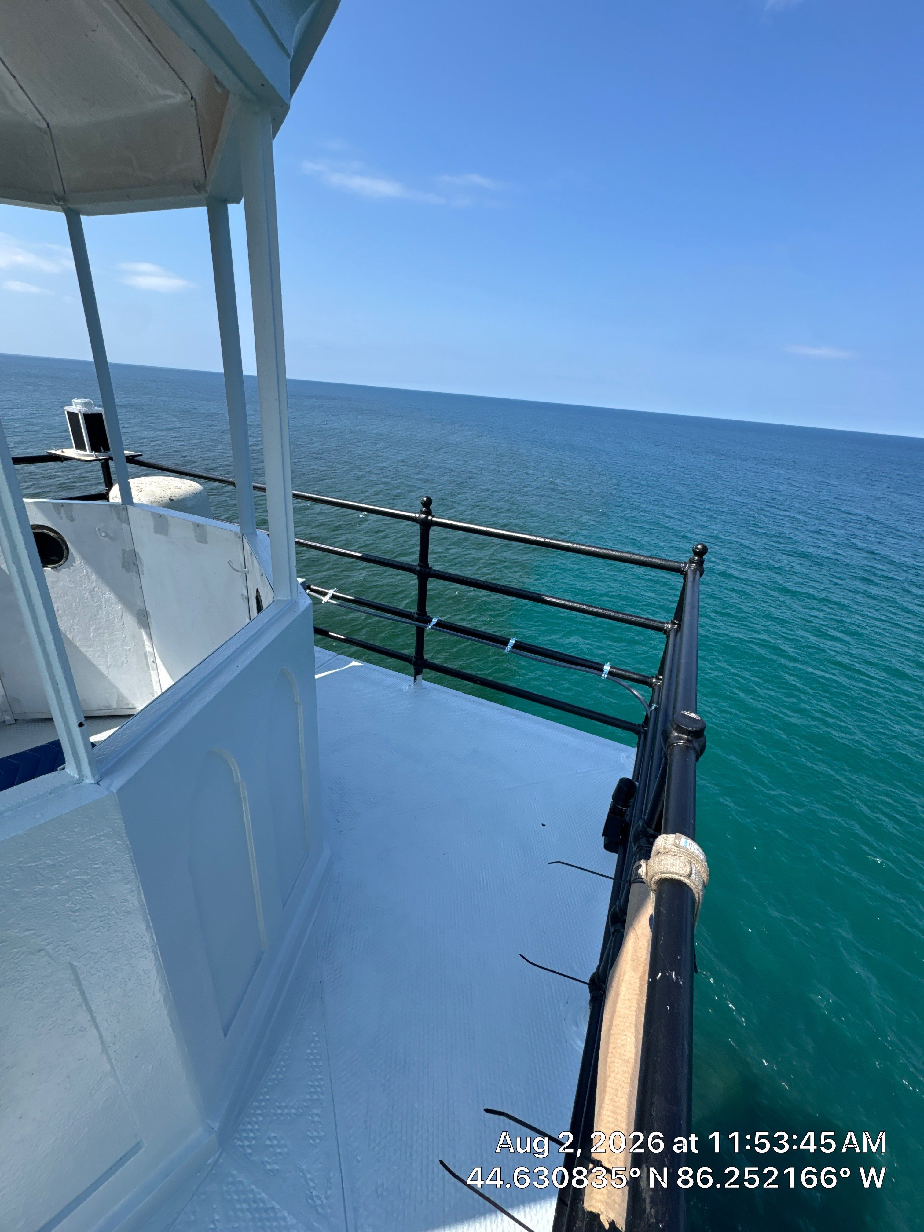 Historical Restoration and Coating of Frankfort North Breakwater Lighthouse by Finkle Preservation & Construction 