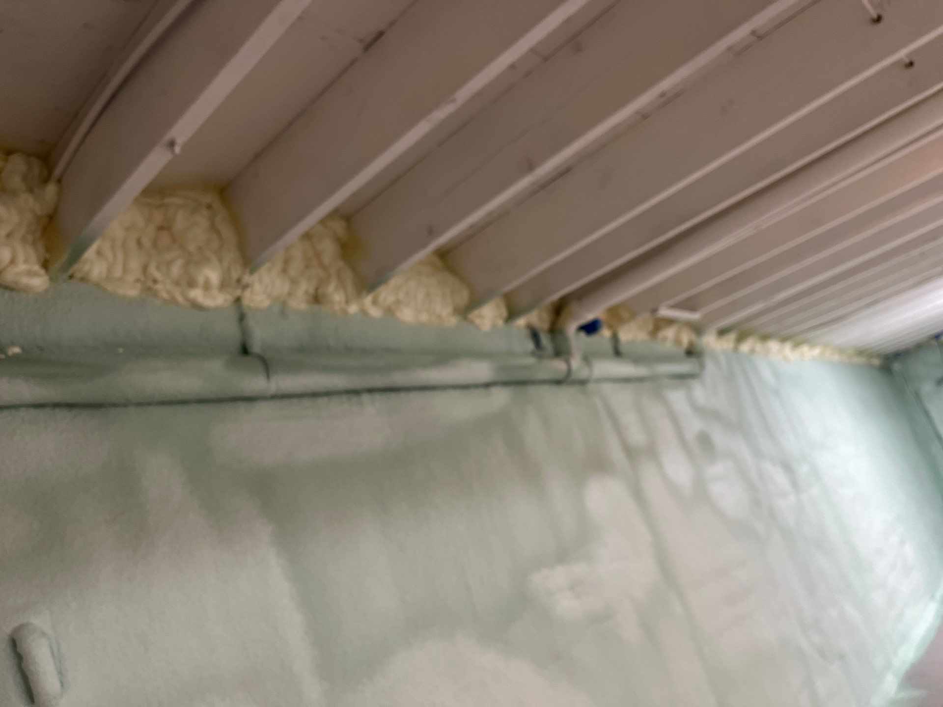 Basement Exterior Walls using Closed Cell Spray Foam by NYS Foam & Energy