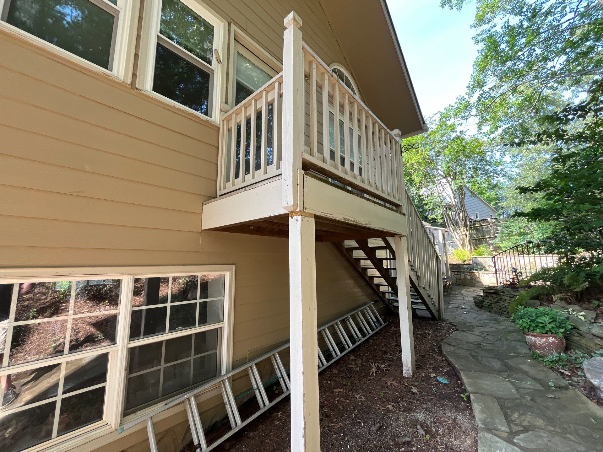 Rotted Wood Replacement, Deck Stain, and Exterior Paint Project in Kennesaw, GA by Nelson Exteriors 