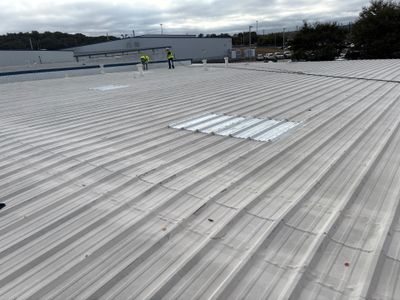 Clean, finished white metal roof surface