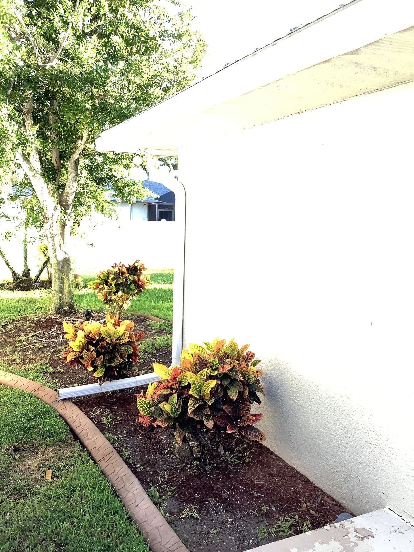 Downspout Installation using 3X4 Elbow Downspout in Cape Coral by Gutter Professors