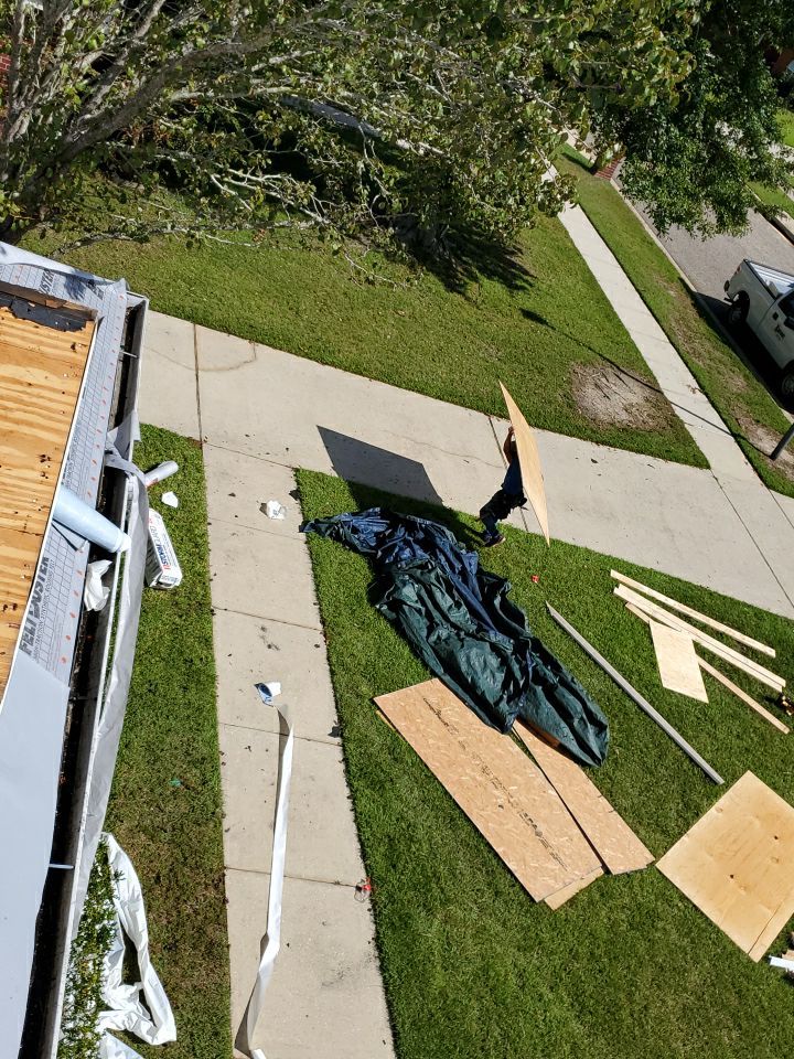 Residential Roofing Installation using Roof Replacement by American Roofing & Construction LLC
