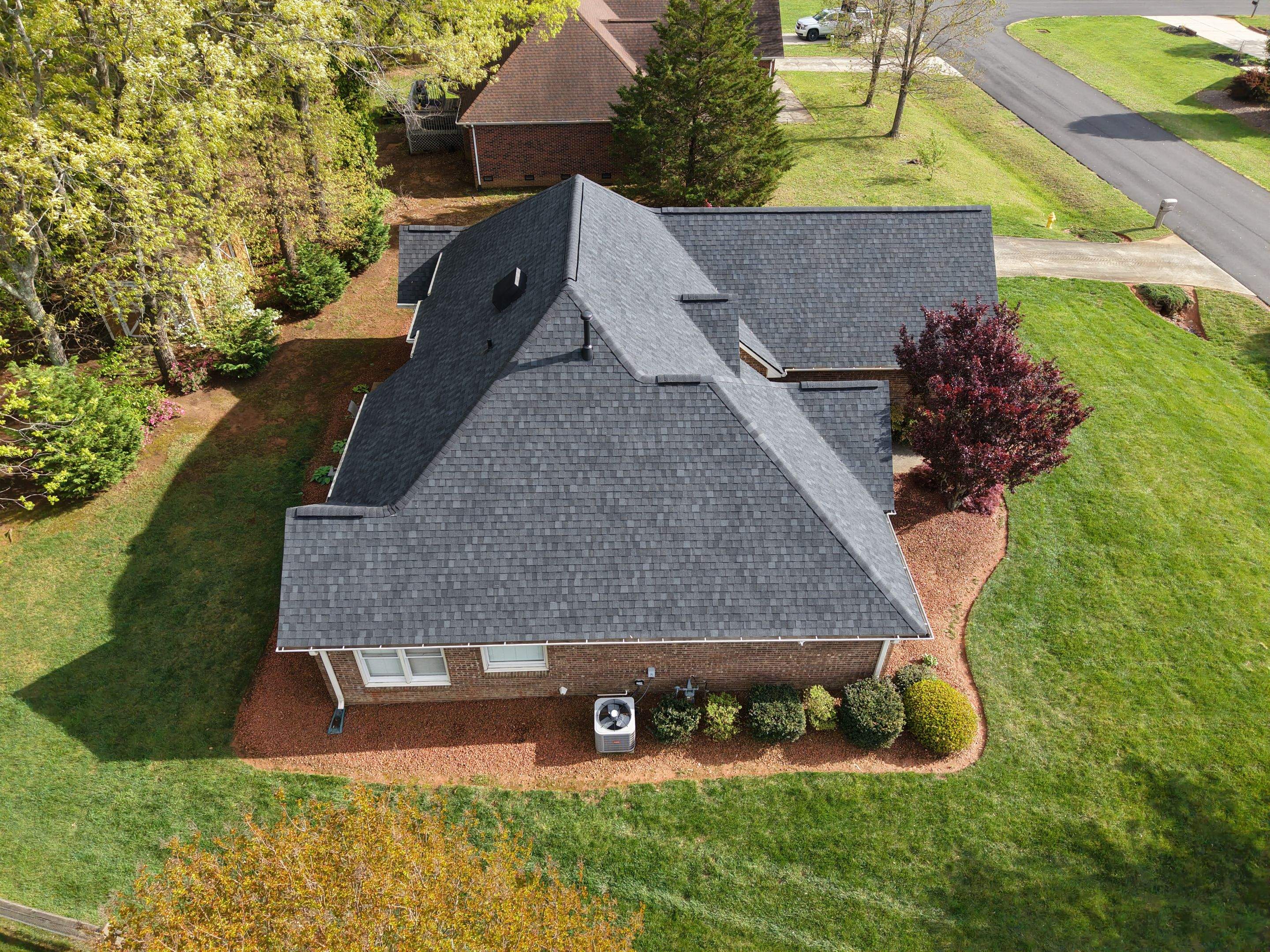 Residential Roofing Installation using TAMKO TITAN XT Rustic Black by RISE Roofing & Restoration, LLC
