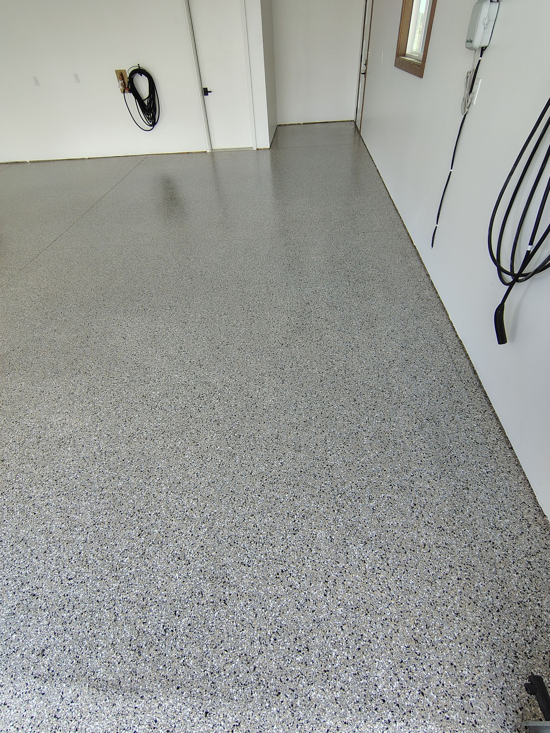 Gray and White Speckled Epoxy Garage Floor Coating in Tea by Select Painting, Coatings & Garage Cabinets