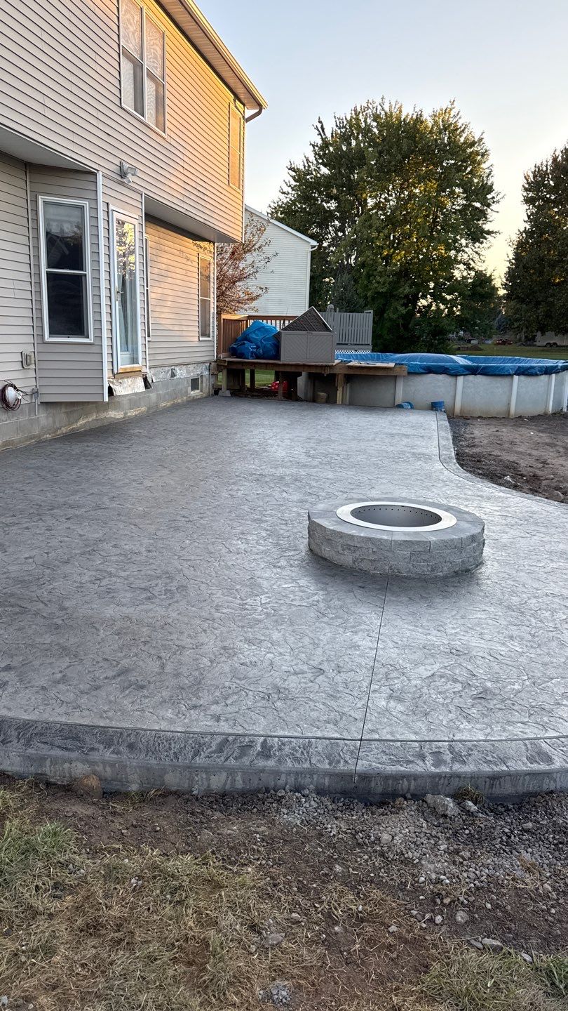 Oxford slate stamped concrete patio by NG Masonry & Construction LLC
