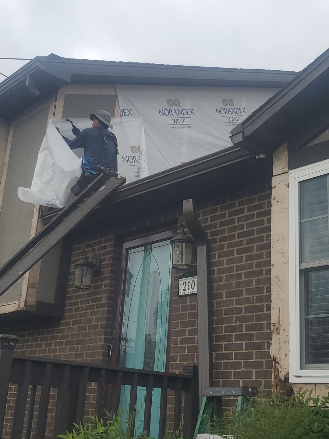 Siding Installation using Vinyl Siding by Rainstoppers Roofing