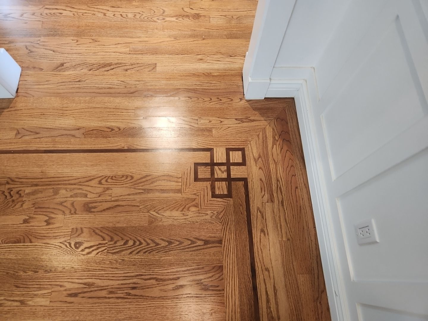 Ann Arbor Elegance: Red Oak and Walnut Living Room Masterpiece by Ann Arbor Hardwoods