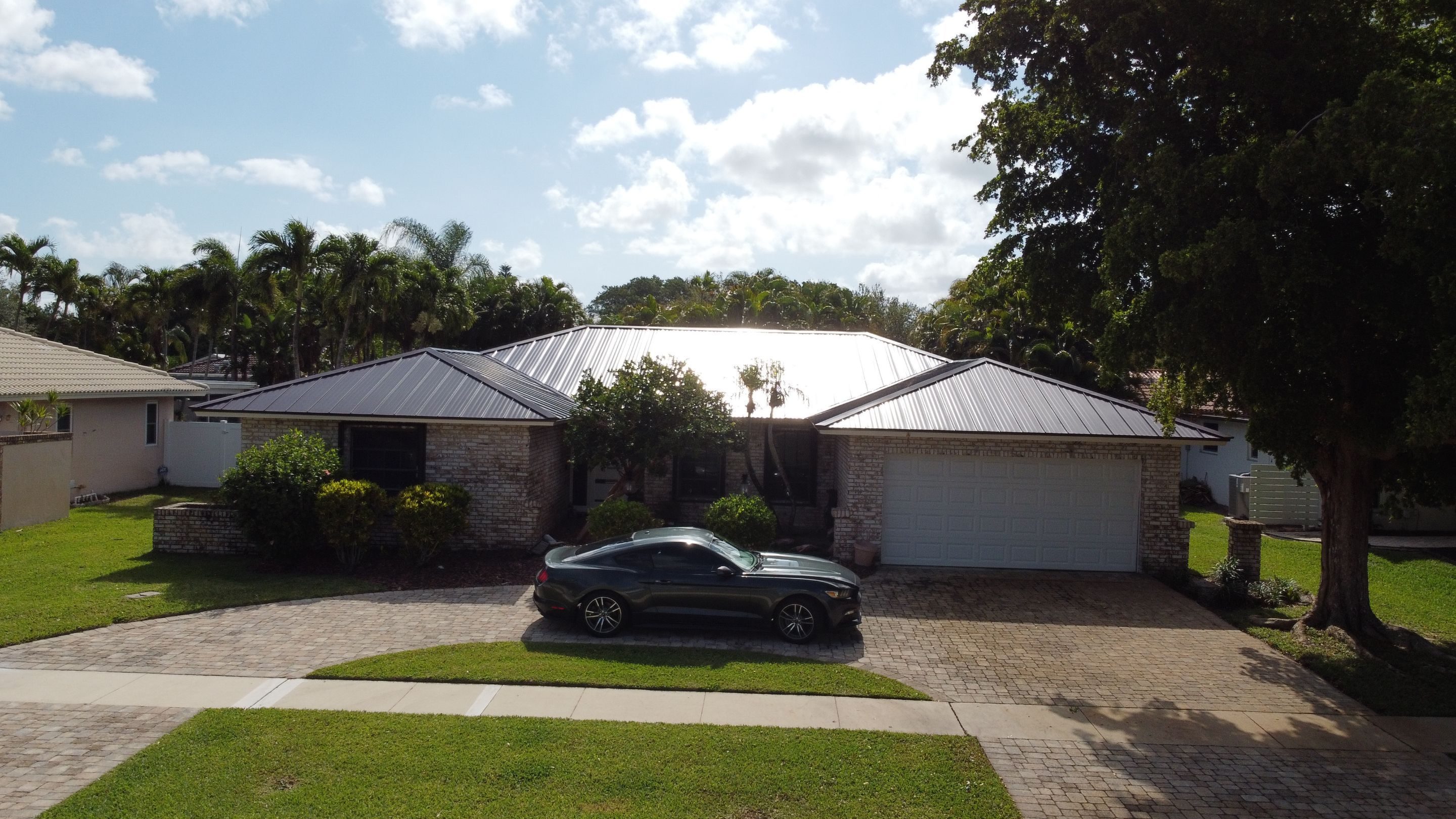 Residential Roofing Installation using 1" Nail strip metal roof by BLUES BROTHERS ROOFING