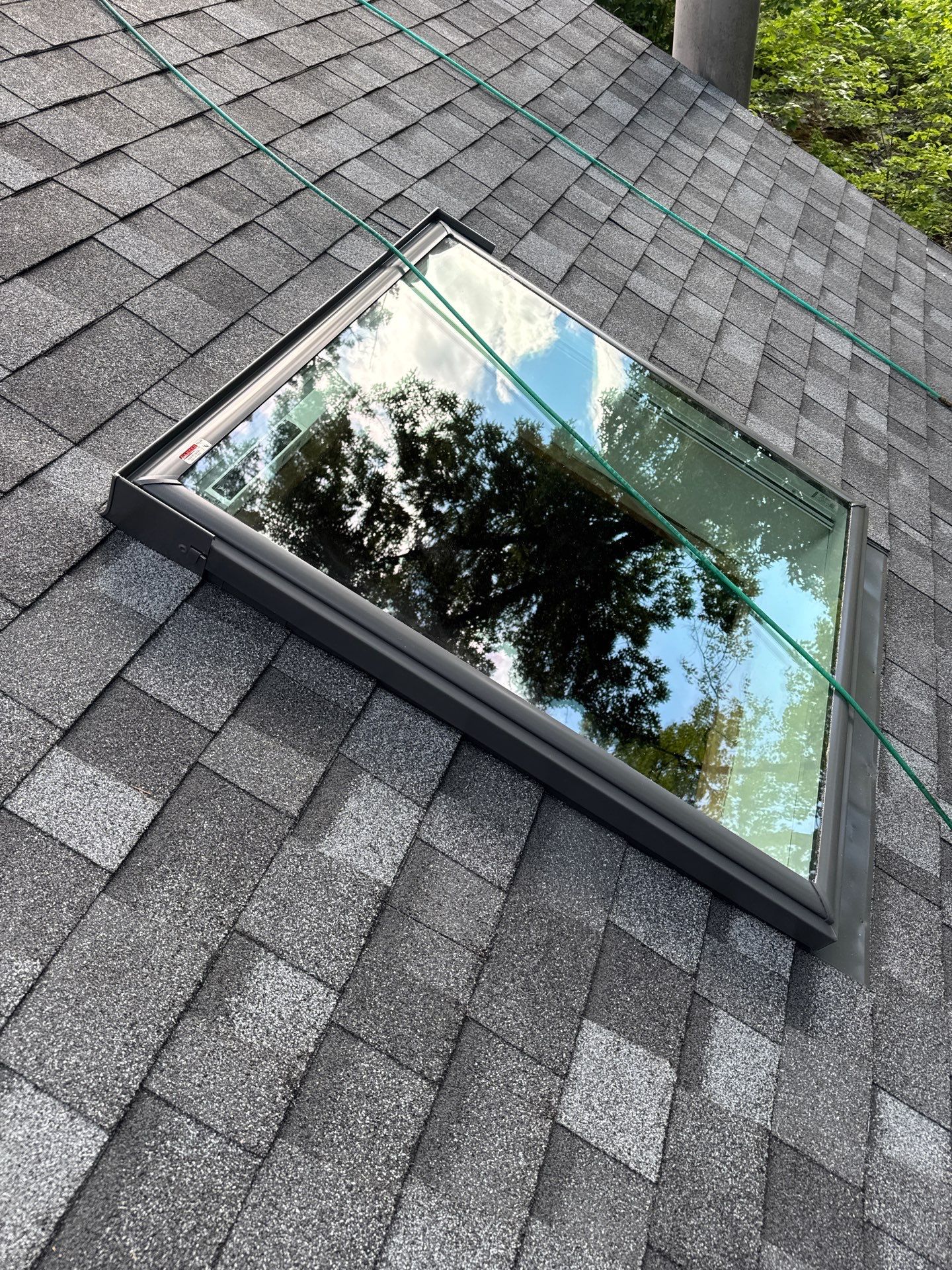 Nashua NH Roof Replacement with Owens Corning Slatestone Gray Shingles, Black Drip Edge, and White AZEK Trim by Compass exteriors
