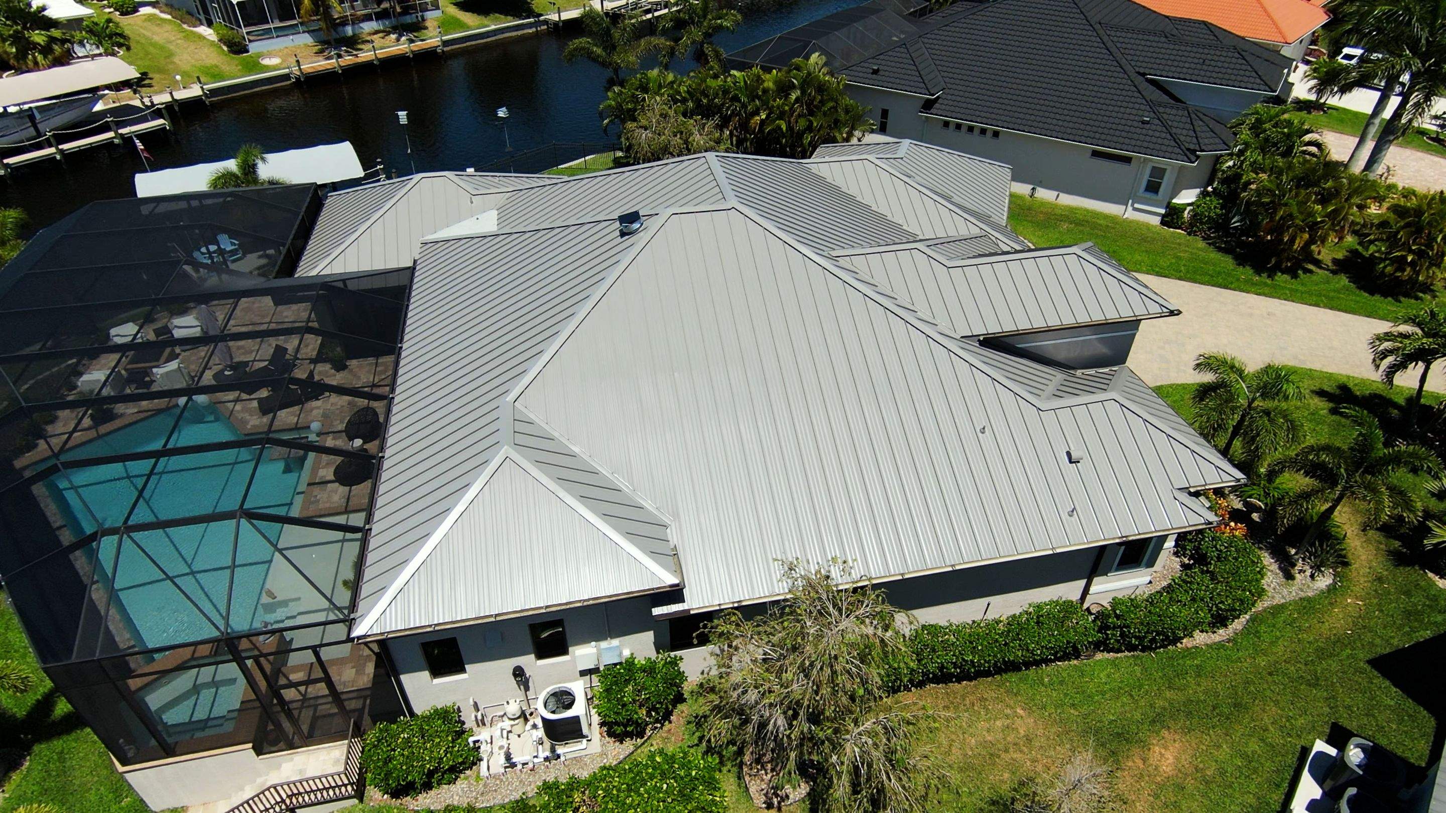 Residential Roofing Installation using Gulf Coast Metals Gulf Seam Panels by Four Peaks Roofing