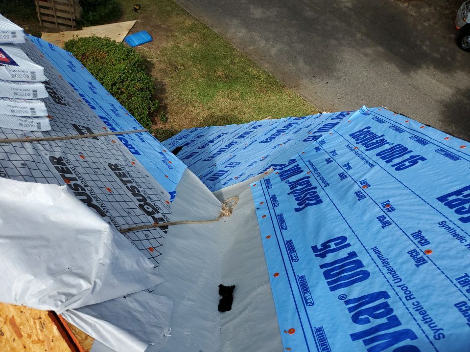 Residential Roofing Installation using Roof Replacement by American Roofing & Construction LLC