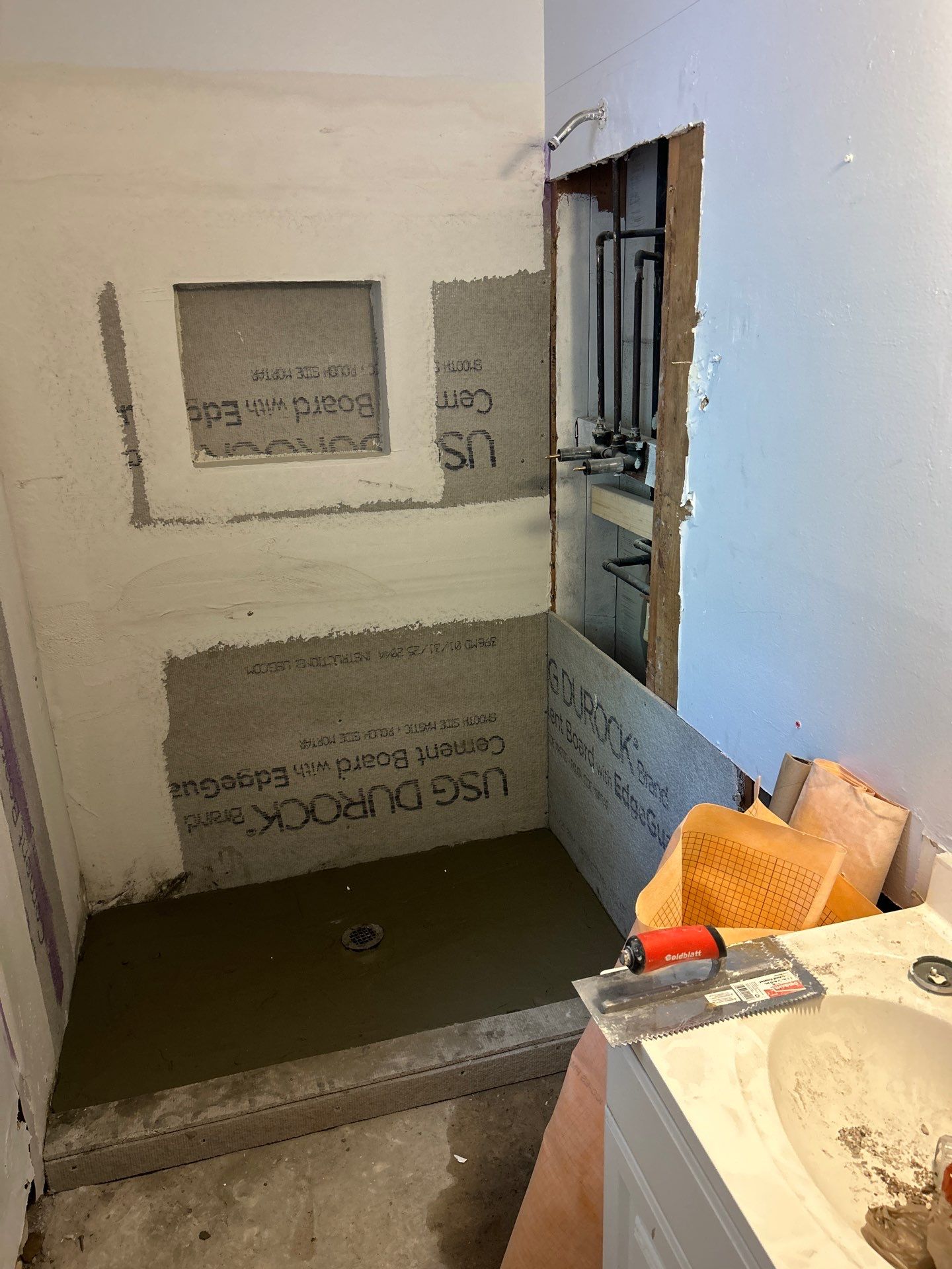 Dual Bathroom Makeover by urban green energy llc