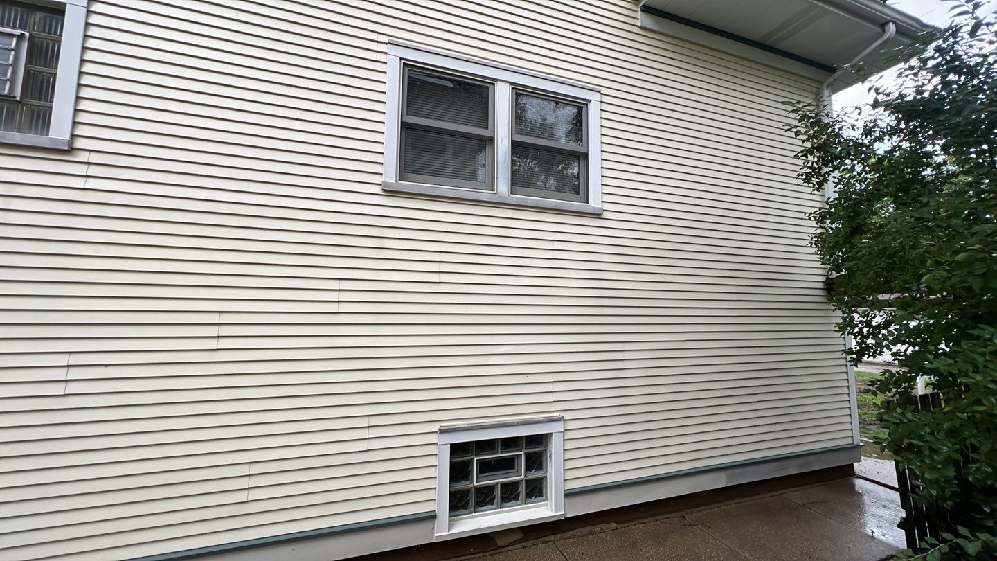 Housewashing  using Algaecide, soft wash soap by Northern Power Washing LLC.