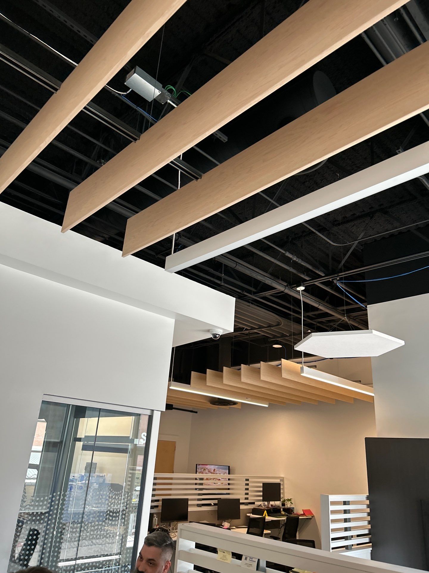 Office Remodel Featuring Acoustic Baffles and Professional Carpet Installation by CompanyCam Sales Demo