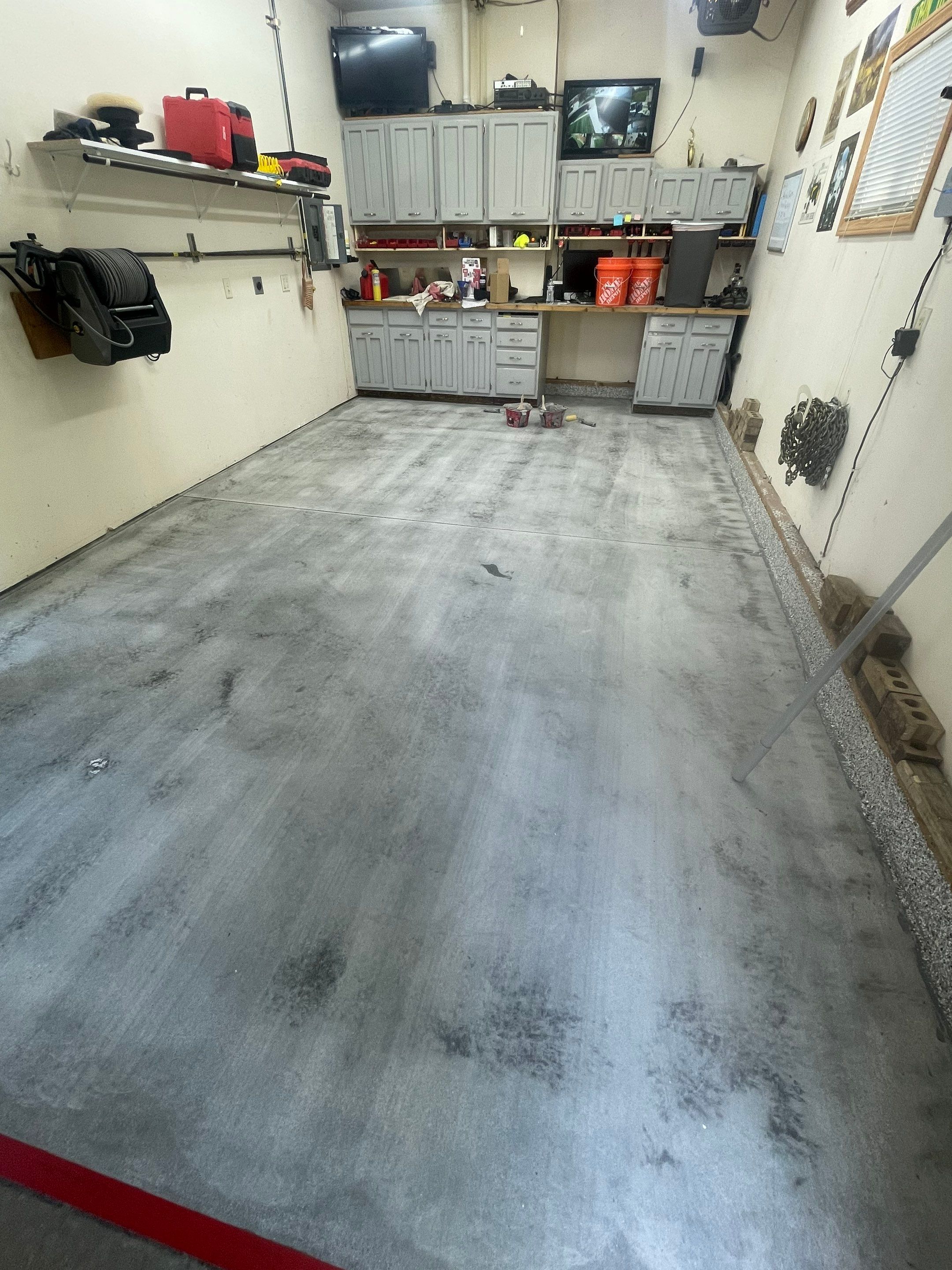 Multi-Stall Garage Floor Coating Installation in Sioux Falls by Select Painting, Coatings & Garage Cabinets