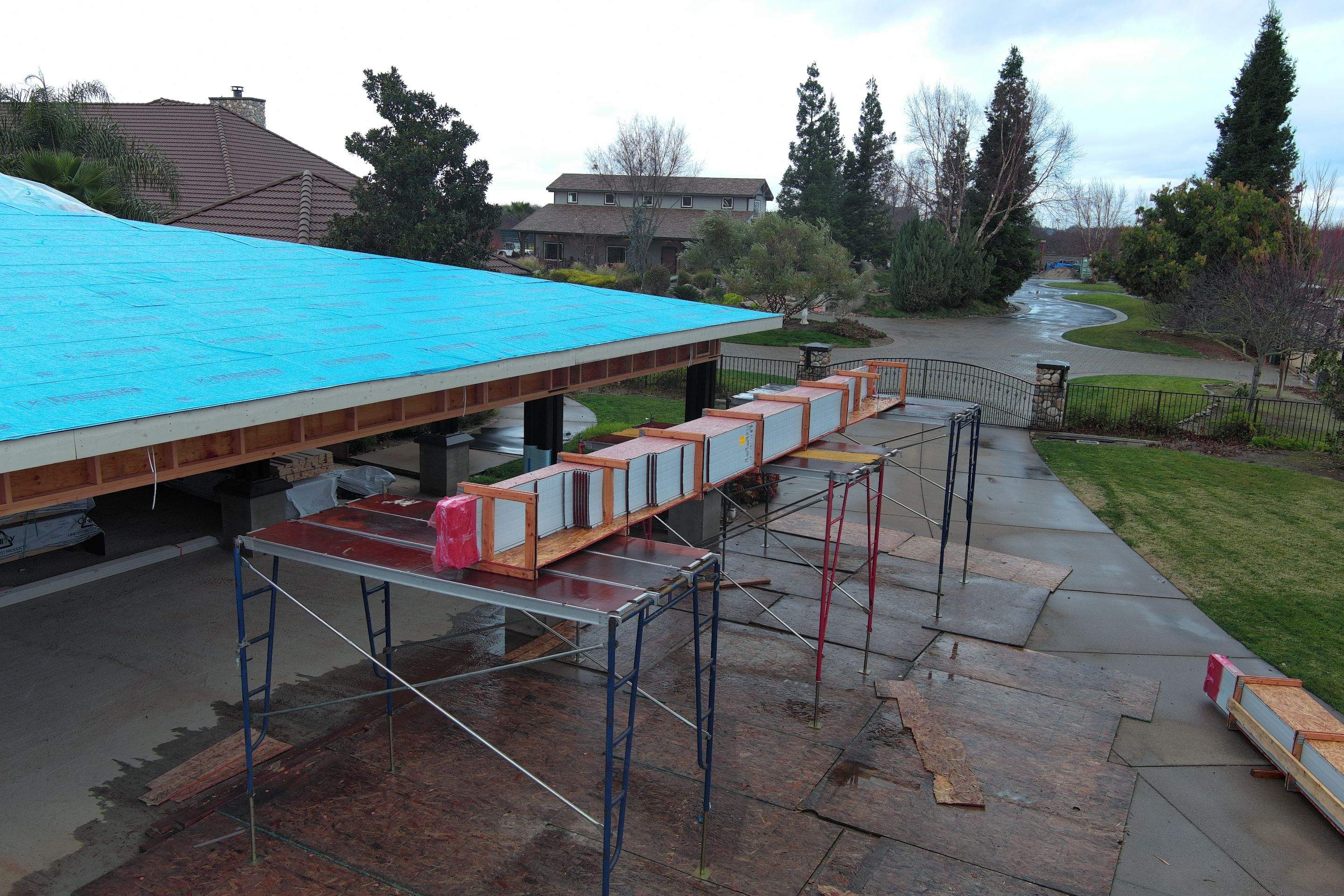 Tile, Metal, and TPO roofing project (new construction) by Straight Edge Roofing Inc