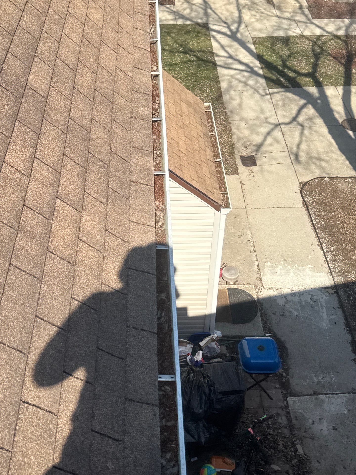 Commercial gutter cleaning Lombard, IL before photo with filled gutters
