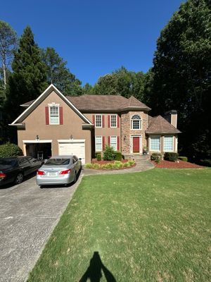 Exterior Painting and Comprehensive Wood Deck Repairs in Suwanee