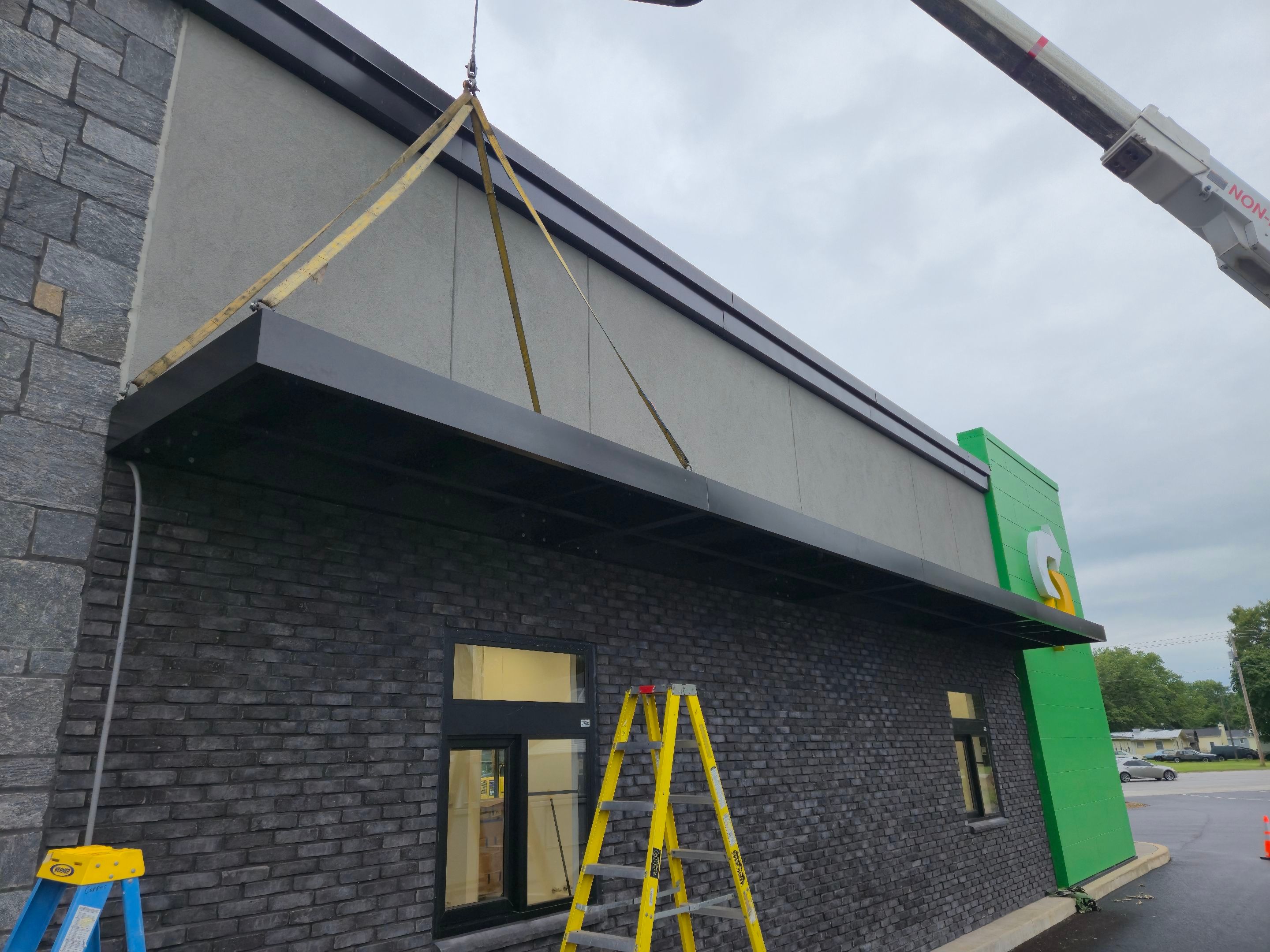 Subway Awning Installation in Granger by Hayes Design co