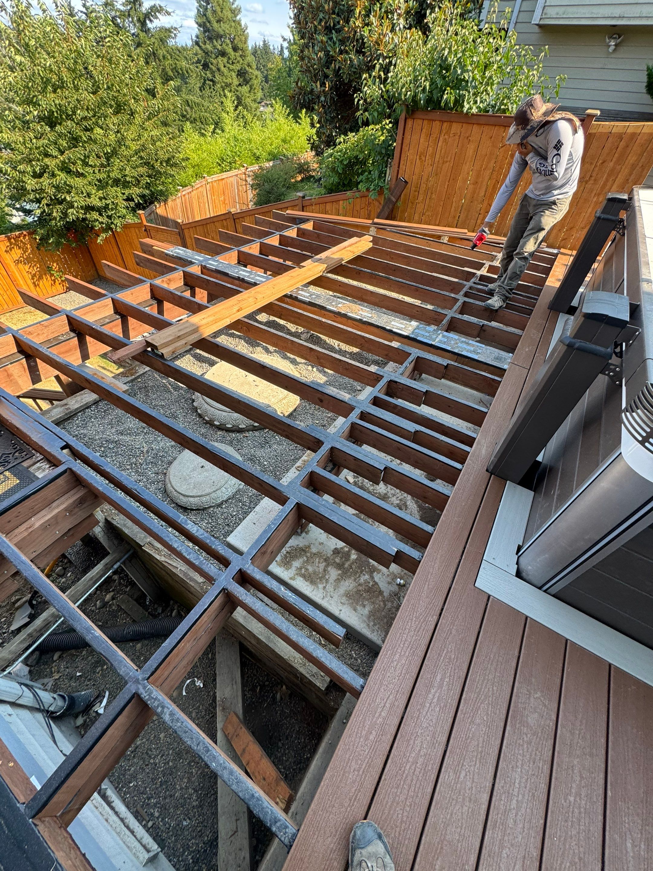 Tacoma Custom Composite Deck and Hot Tub Surround with Retaining Wall by Emerald City Energy 