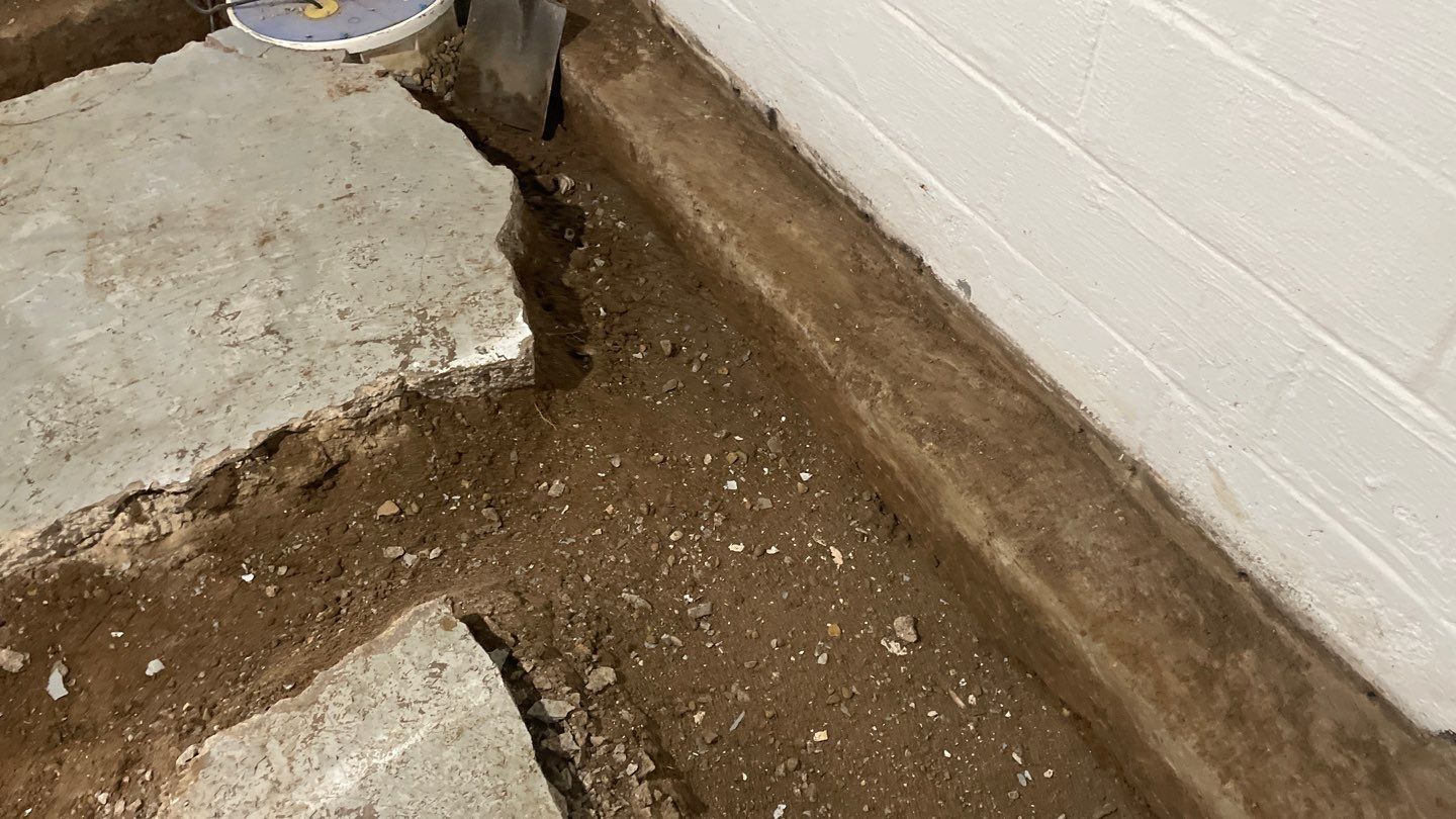 Interior Drain Tile & Yard French Drain in St. Paul, MN by Waterproofing Northeast