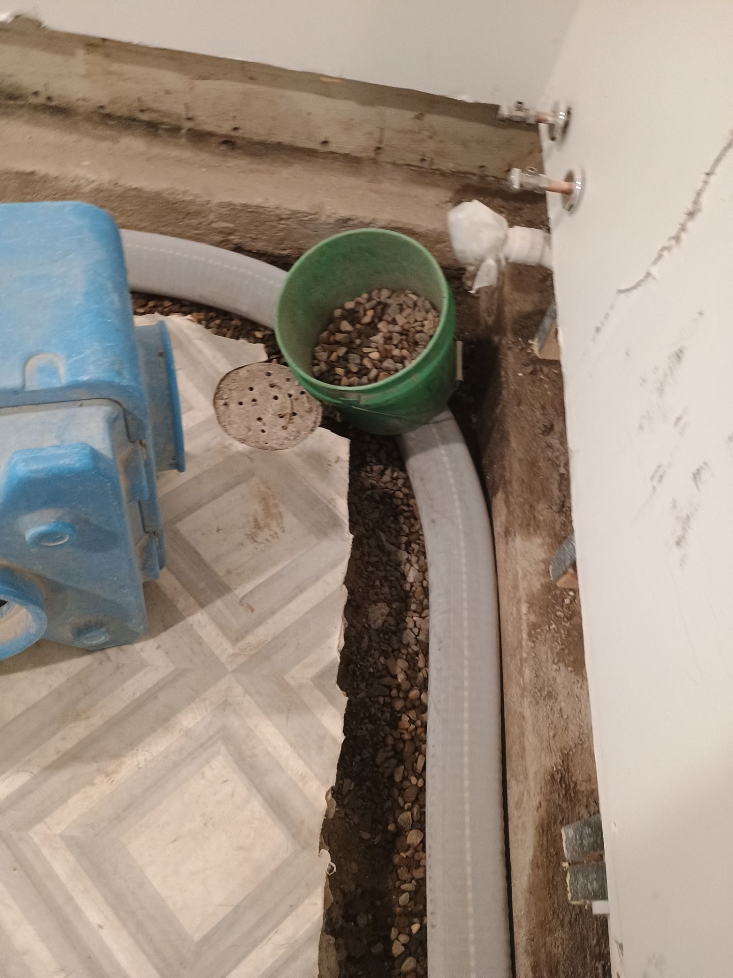 Interior Drain Tile & Buried Discharge in St. Anthony, MN by Waterproofing Northeast