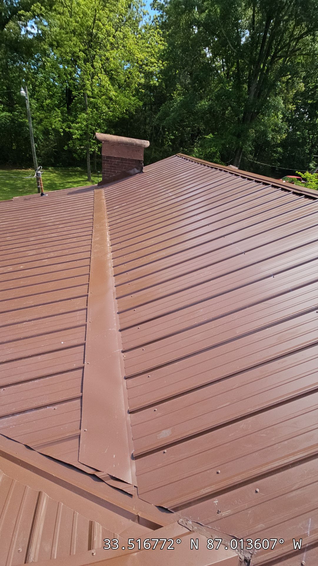 Metal Roof Replacement in Sylvan Springs (Brown) by The Roofing Dudes