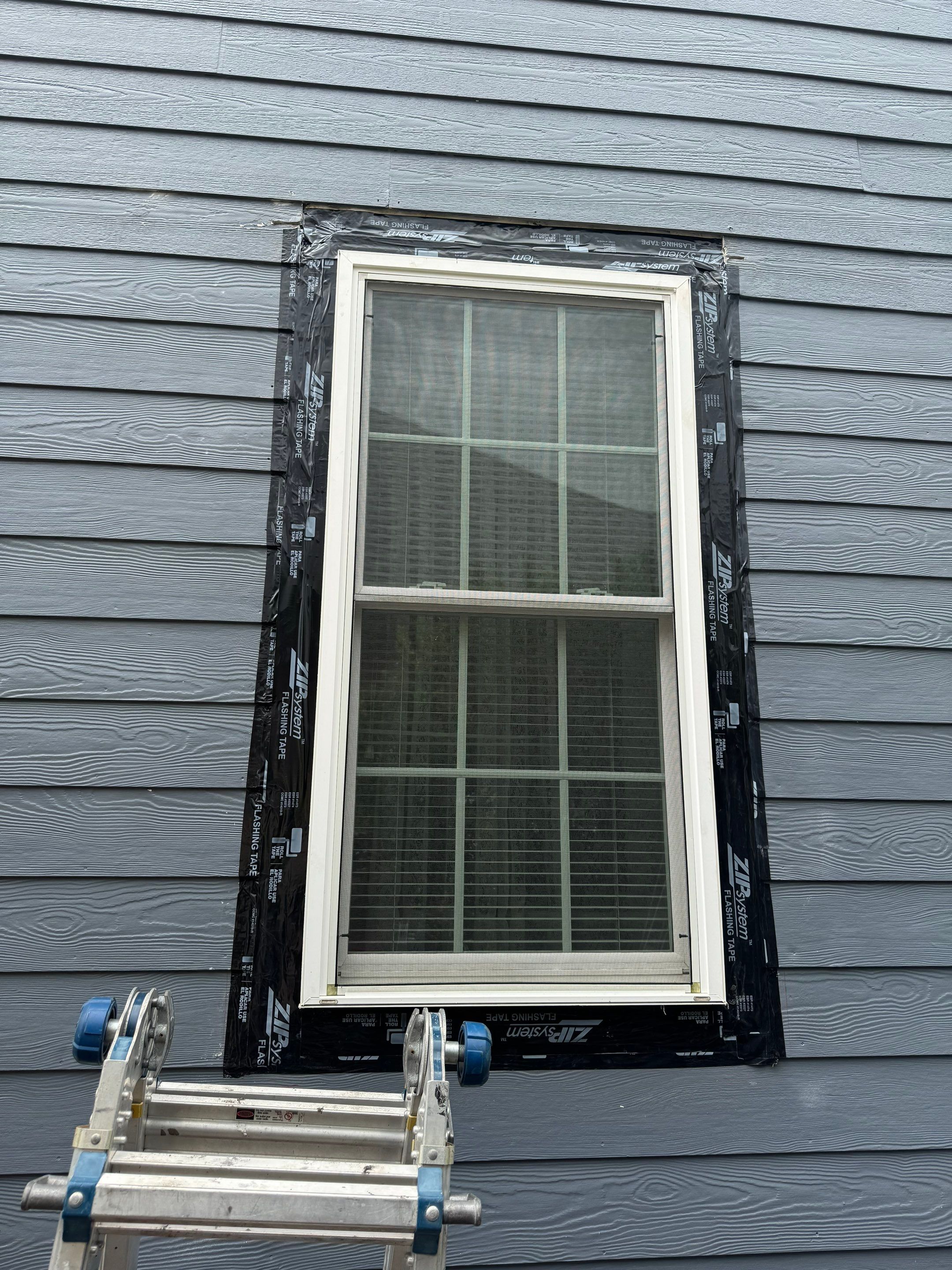 Window Surround and Siding Repairs in Southport, NC by RGR Construction and Roofing, LLC