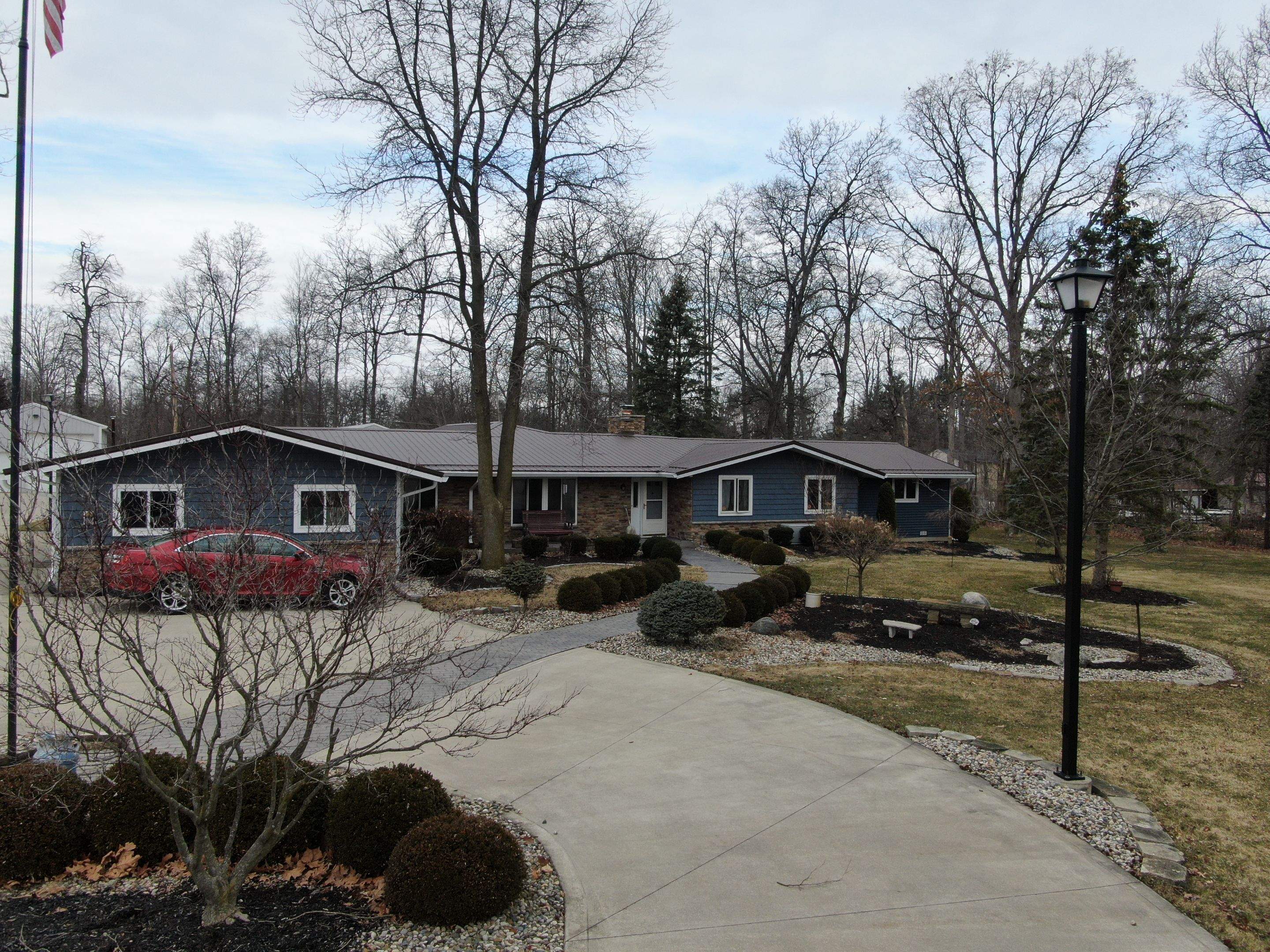 Residential Roofing Installation using Exposed Fastener Metal Roof by 4Ever Metal Roofing